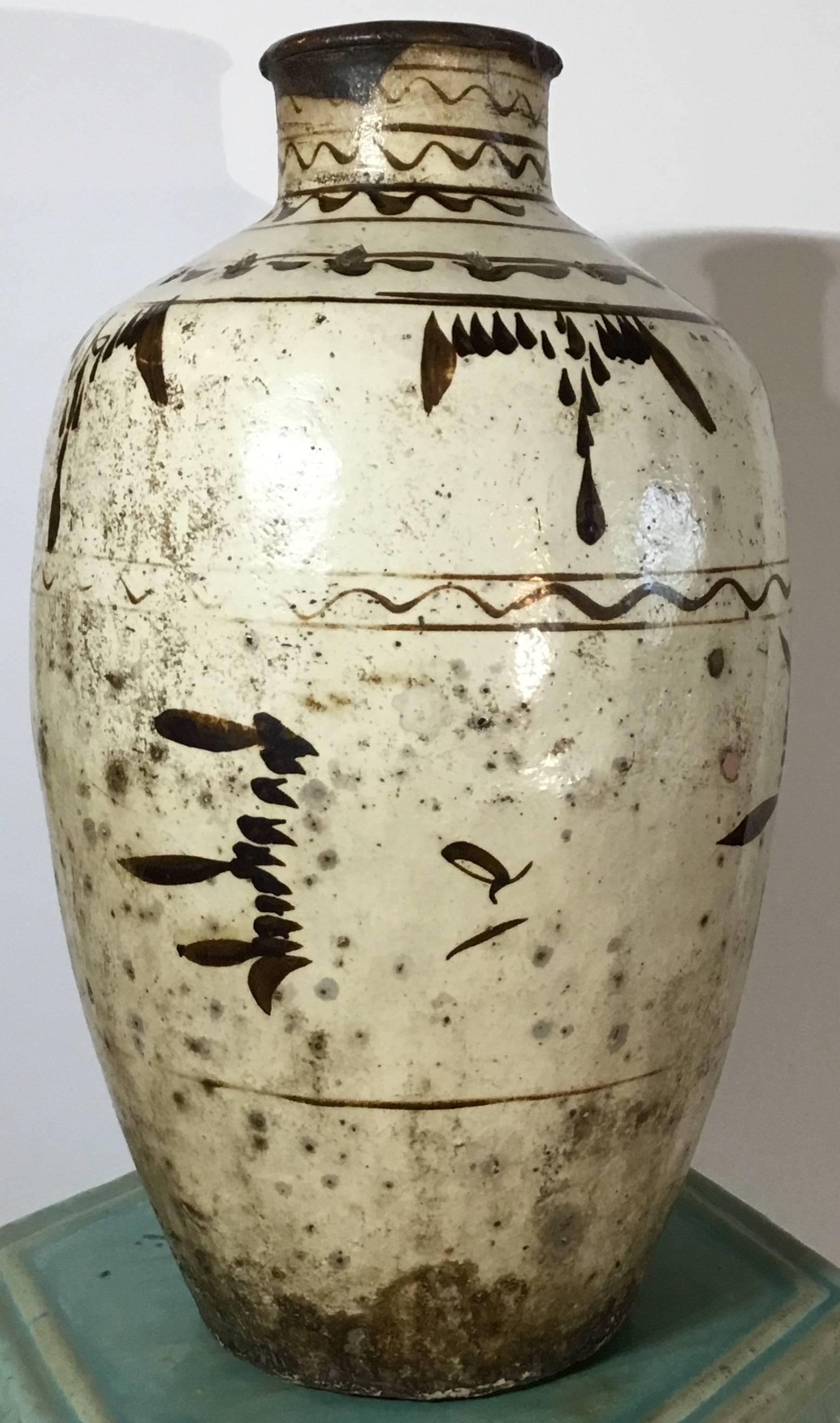 Beautiful stoneware Chinese jar hand-painted and glazed, decorated with Chinese motifs or calligraphy like, to make exceptional object of art.
Two more available.