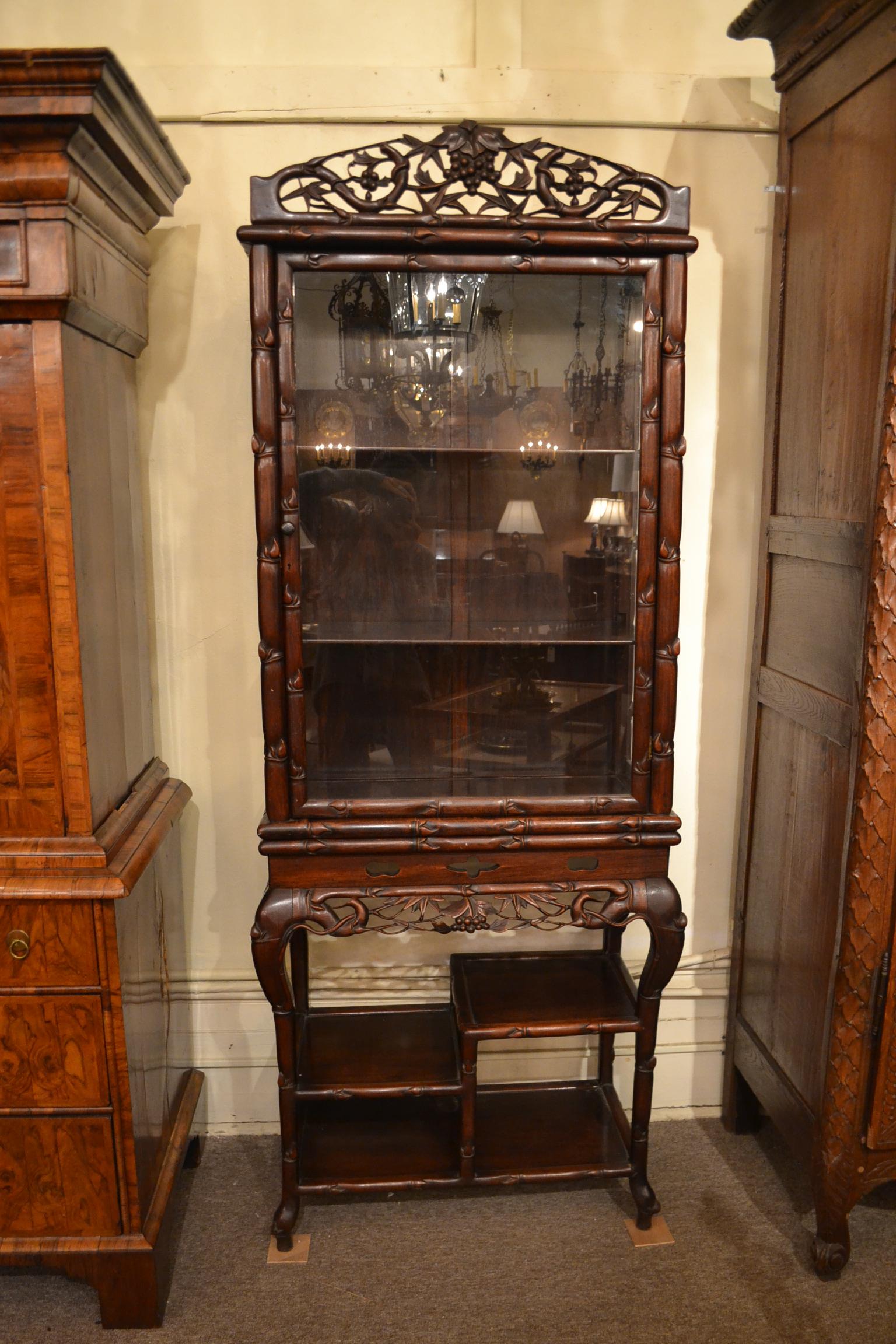 small antique china cabinet with glass doors