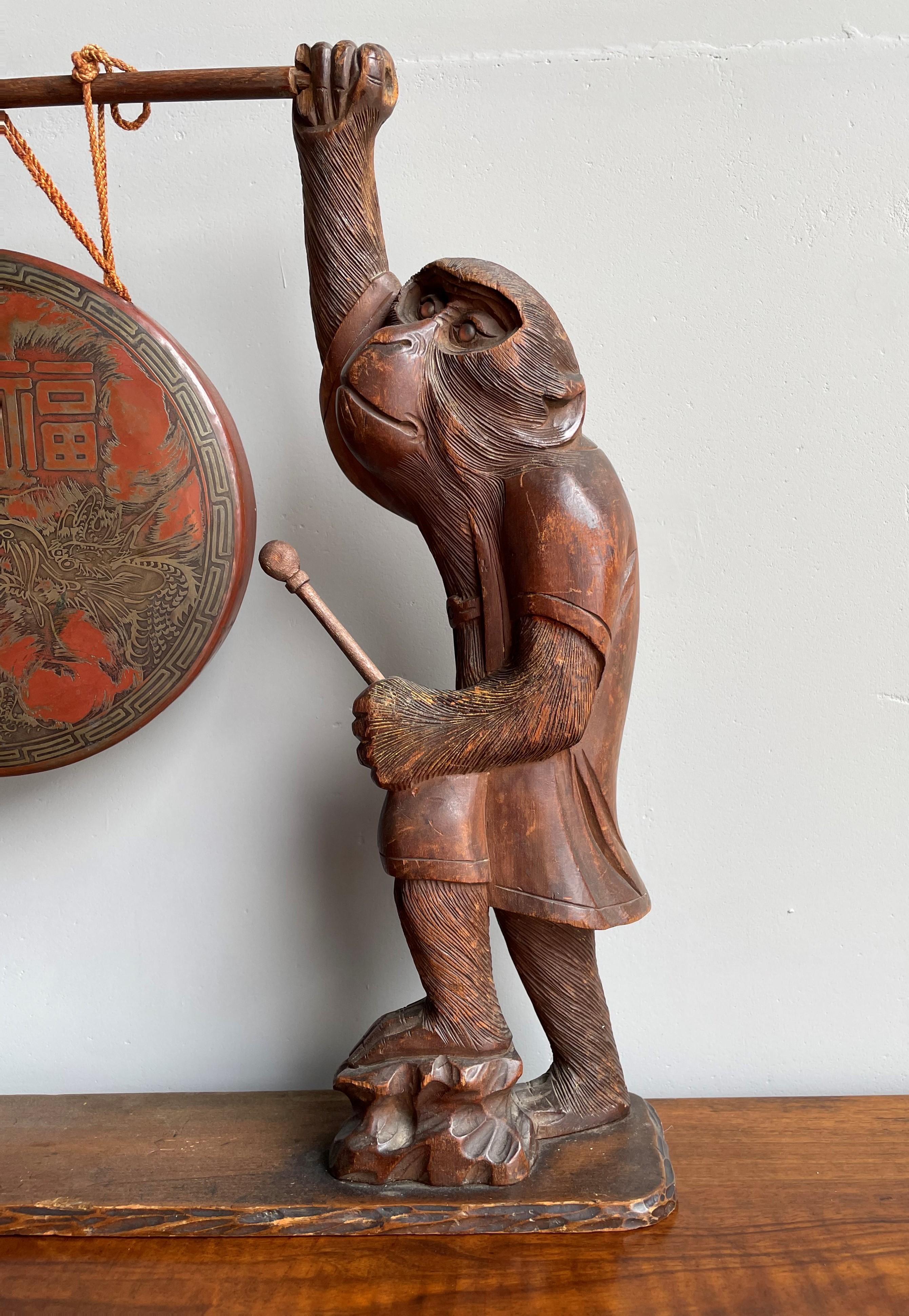 20th Century Antique Chinese Table Gong Held Up by Two Hand Carved Wooden Monkey Sculptures