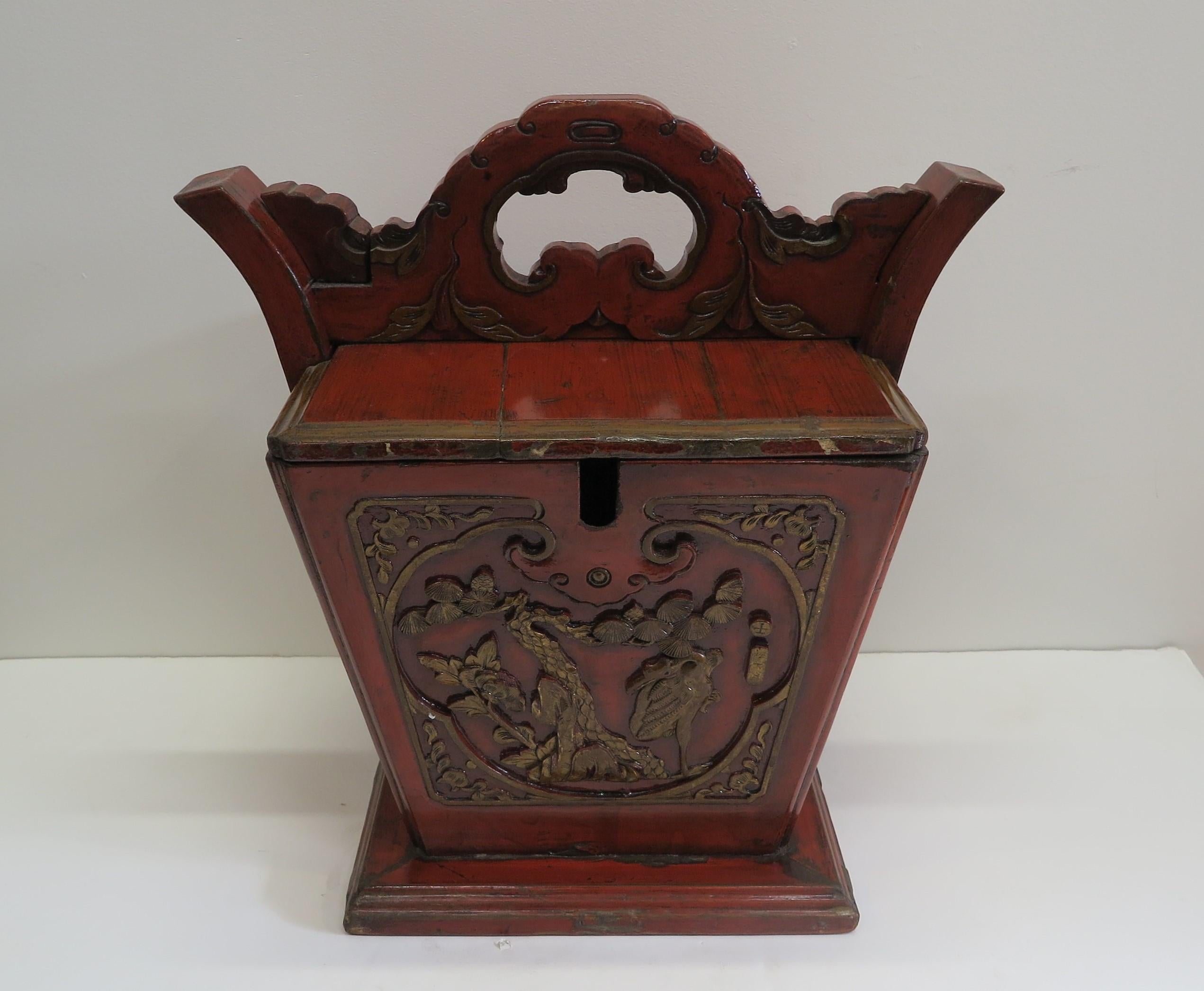 Antique Chinese Tea Caddy. Late 19th century early 20th century Elm Wood carved gilt red lacquered tea caddy. In very good condition a beautiful example. Tea caddies of this larger size where mostly used for large gatherings. Holding a large tea pot