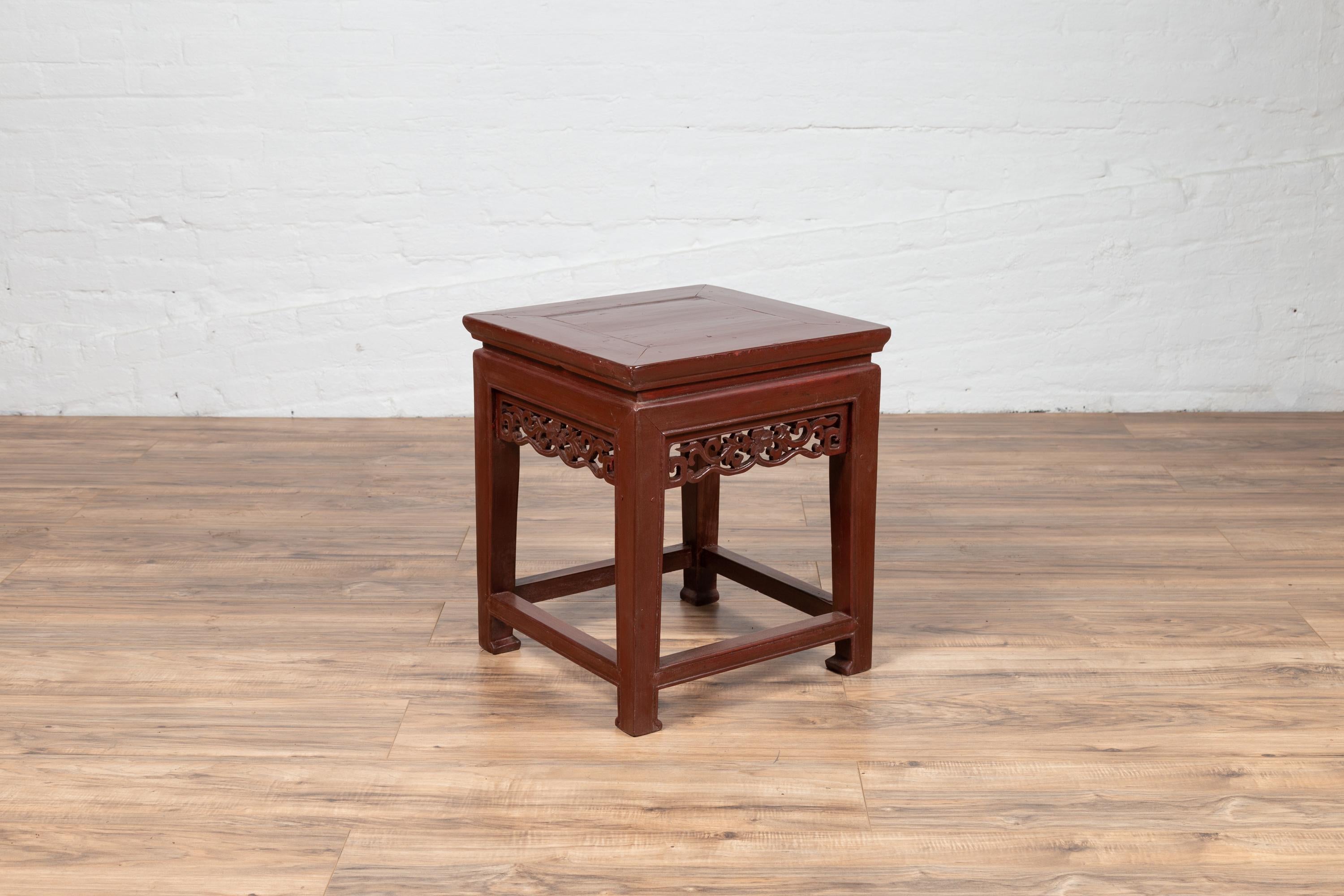 Antique Chinese Waisted Stool with Dark Red Patina and Foliage Hand Carved Apron For Sale 4