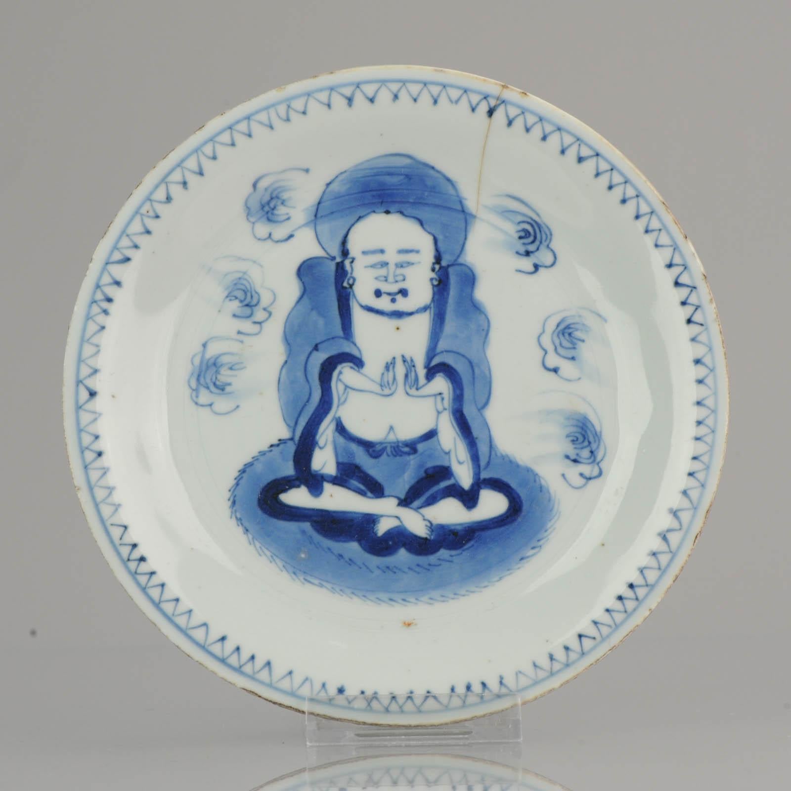 Lovely plate great scene of a monk

Marked at base.

Condition
1 line to rim and some rimfritting/mushikui. 2 firing flaws in base, 1 next to rim and 1 in circle. Size: 188 x 23mm

Period
17th century Ming (1368-1620)
Transitional