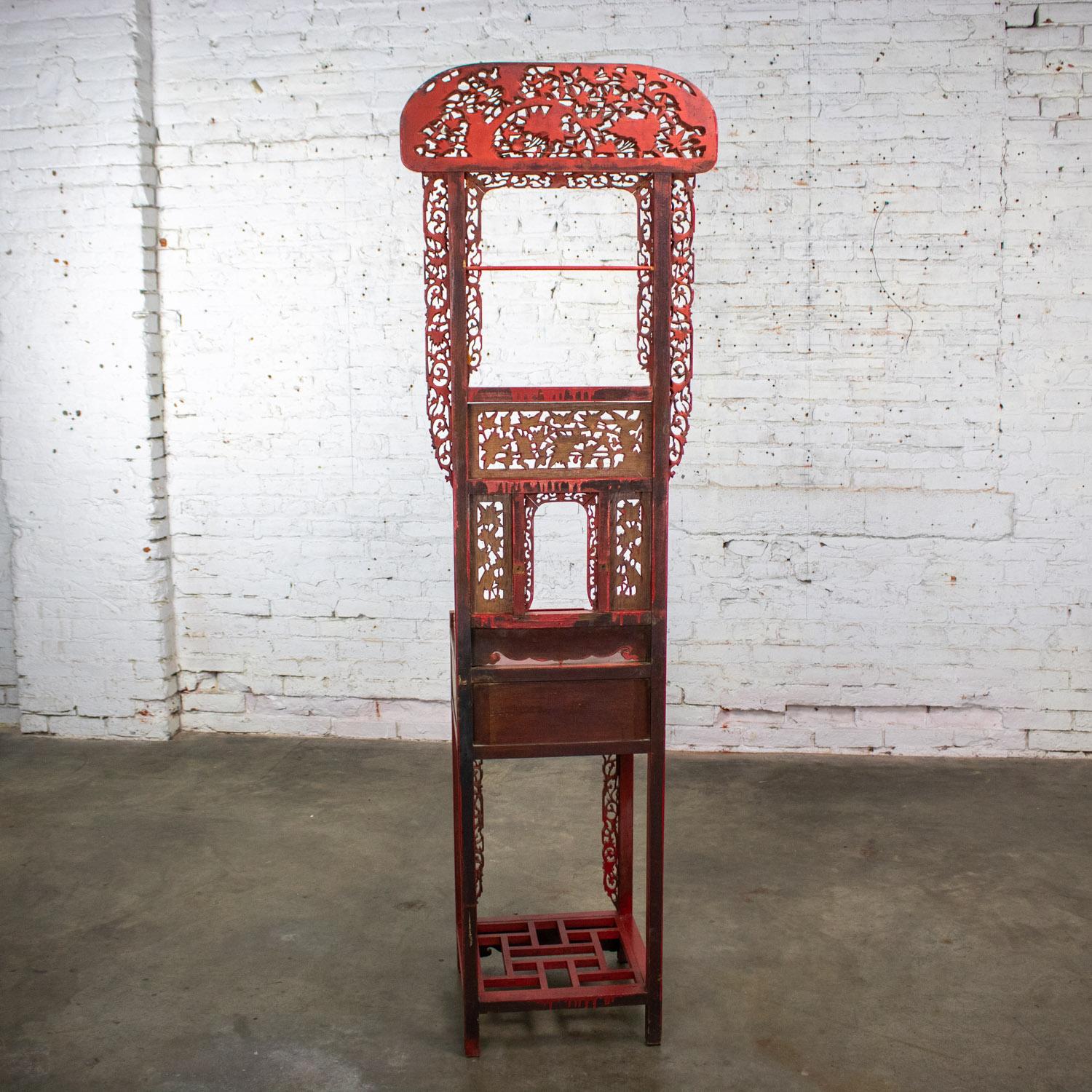 Gorgeous antique Chinese wash basin stand composed of red lacquer & gilded Asian hardwood with all-over hand carved details and a drawer with metal ring pull. Beautiful condition, keeping in mind that this is vintage and not new so will have signs