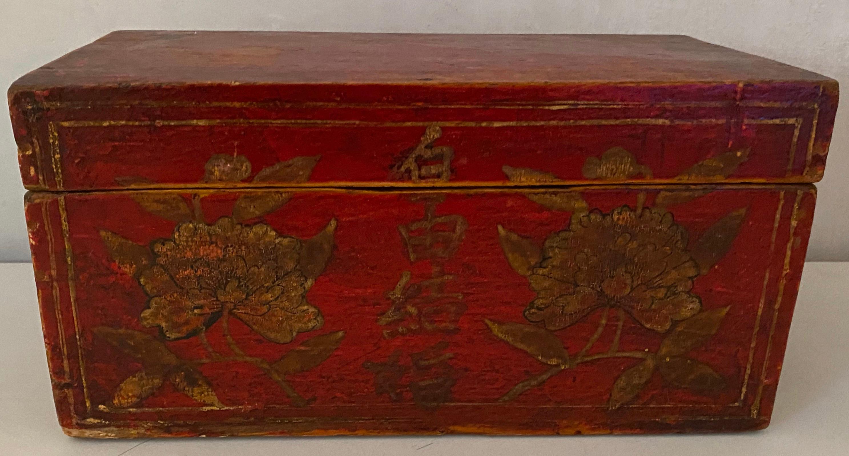 This beautiful small antique Chinese hand painted wooden box is a traditional bridal box.  The family of the bride fills the box with jewelry for their daughter to bring to her new home.  The literal translation of the 4 characters on the box is