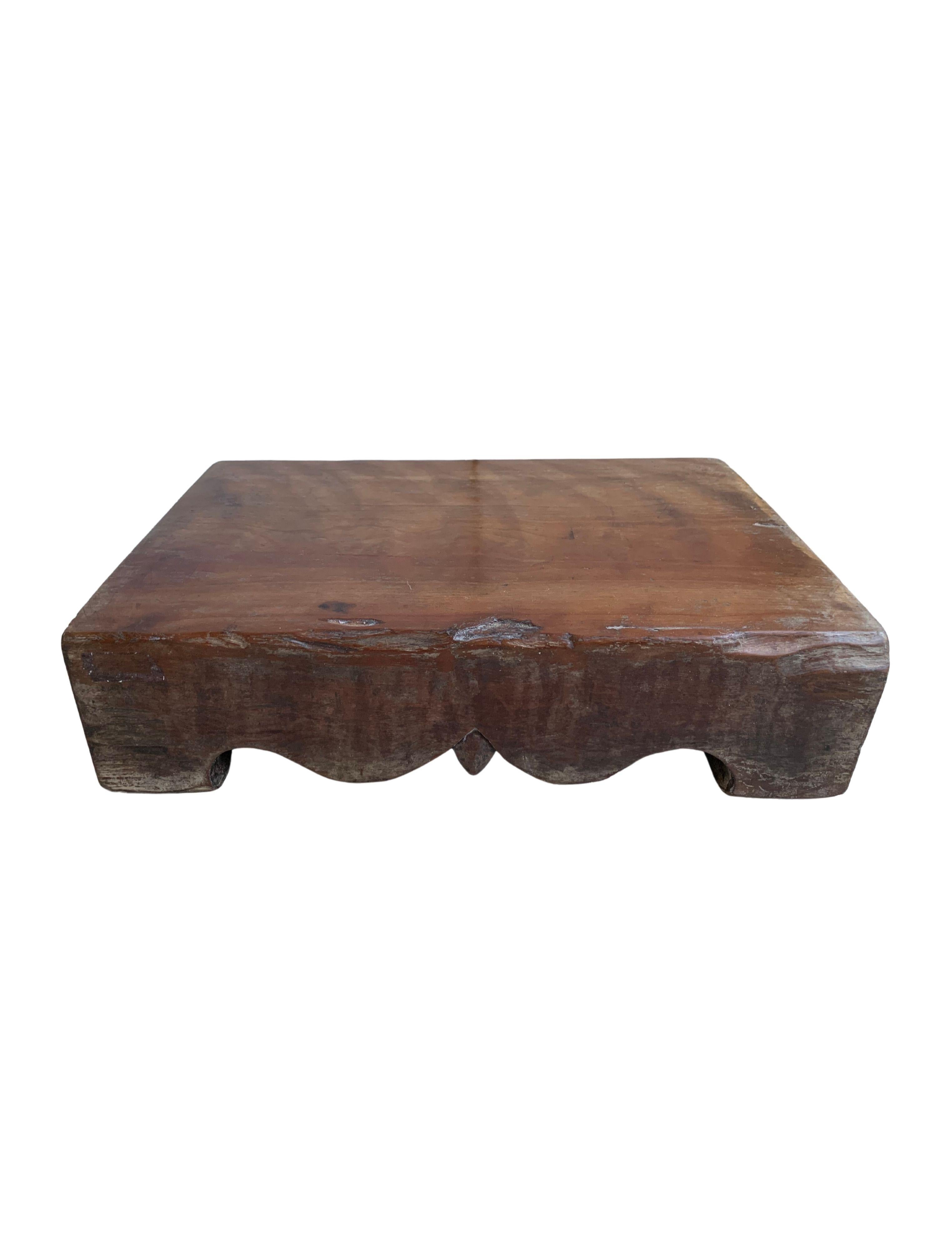 An Antique Chinese chopping block with hand-carved detailing. Made from a single block of hardwood, the block is relatively heavy and solid. A wonderful piece to use as a decorative centrepiece, or cheese / food board. 

 