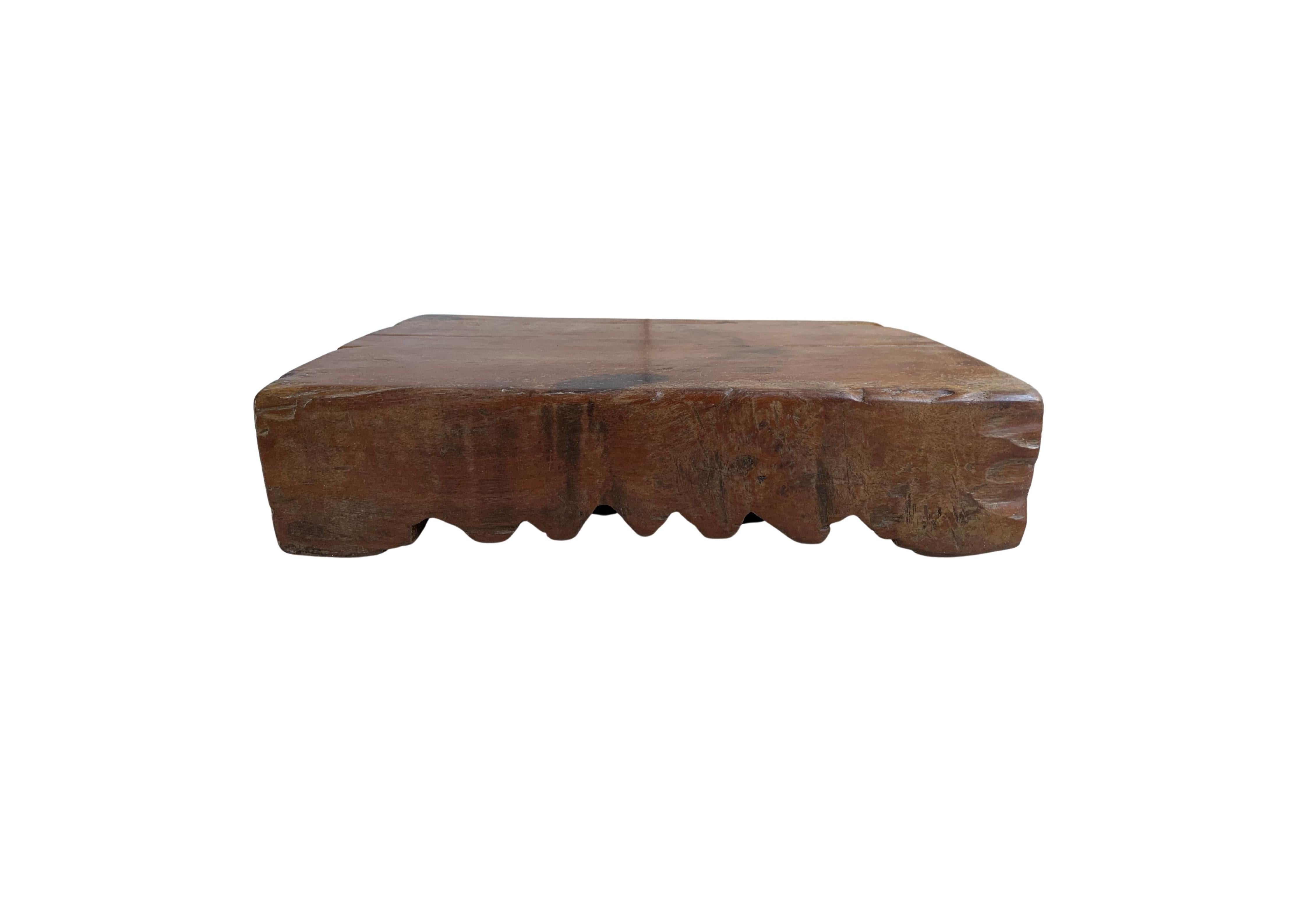 An Antique Chinese chopping block with hand-carved detailing. Made from a single block of hardwood, the block is relatively heavy and solid. A wonderful piece to use as a decorative centrepiece, or cheese / food board. 


