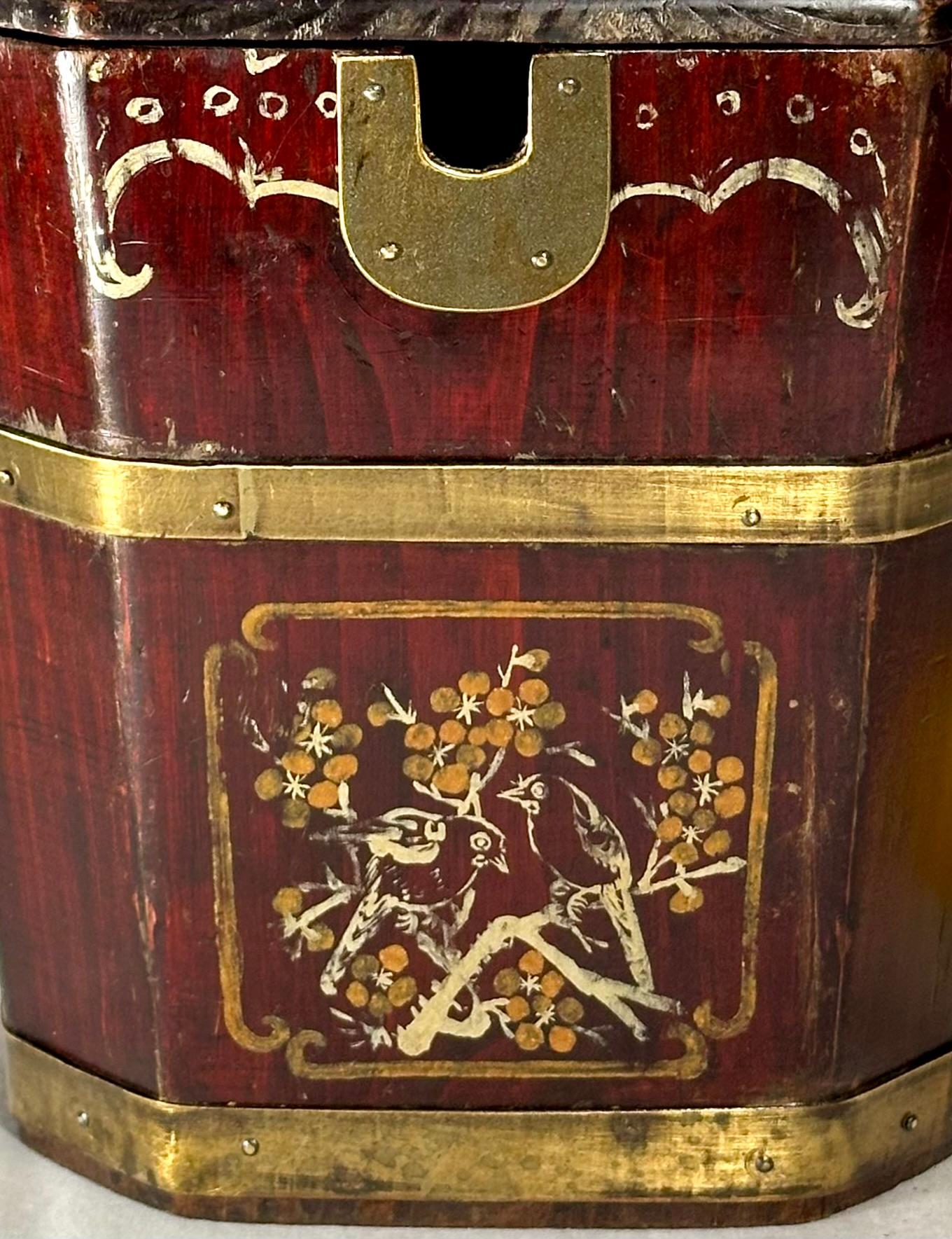 Antique Chinese Wooden Tea Basket.

Early 20th Century wooden tea basket is hand carved and hand painted with Chinese elements.  The hexagonal shaped box is brass banded at the middle and the foot.  The openwork carved handle secures and releases
