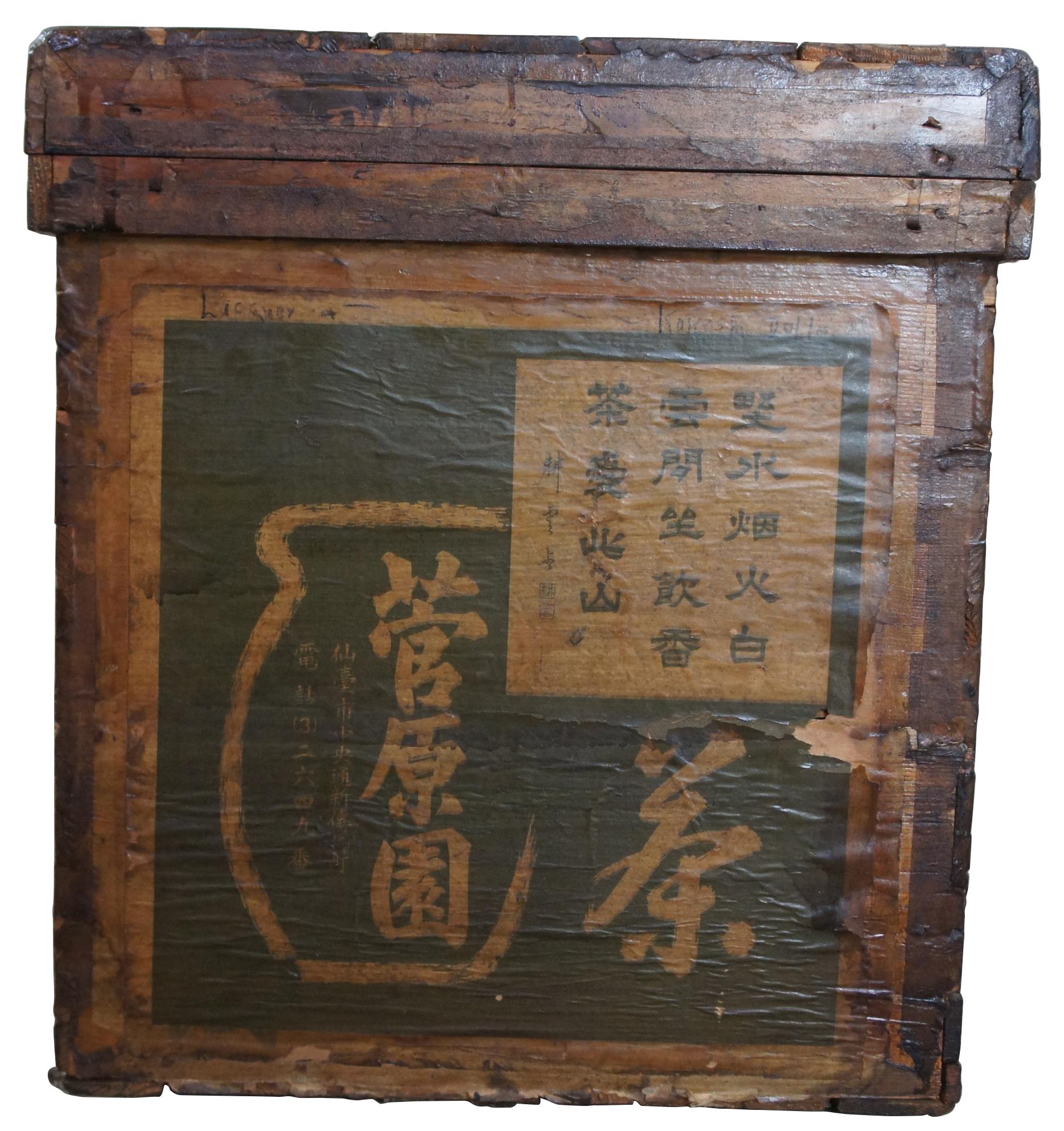 Antique tea shipping crate. Made from wood with paper labeling and tin lining. Measure: 26