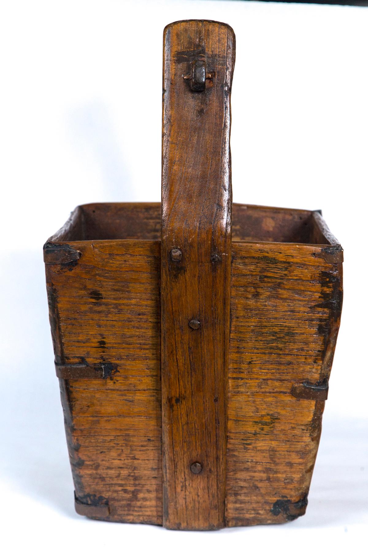 antique wooden water bucket