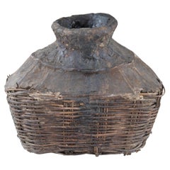 Ancienne jarre chinoise en saule tressé, contenant de l'huile, panier à provisions, vase, etc.