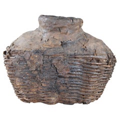 Ancienne jarre chinoise en saule tressé, contenant de l'huile, panier à provisions, vase, etc.