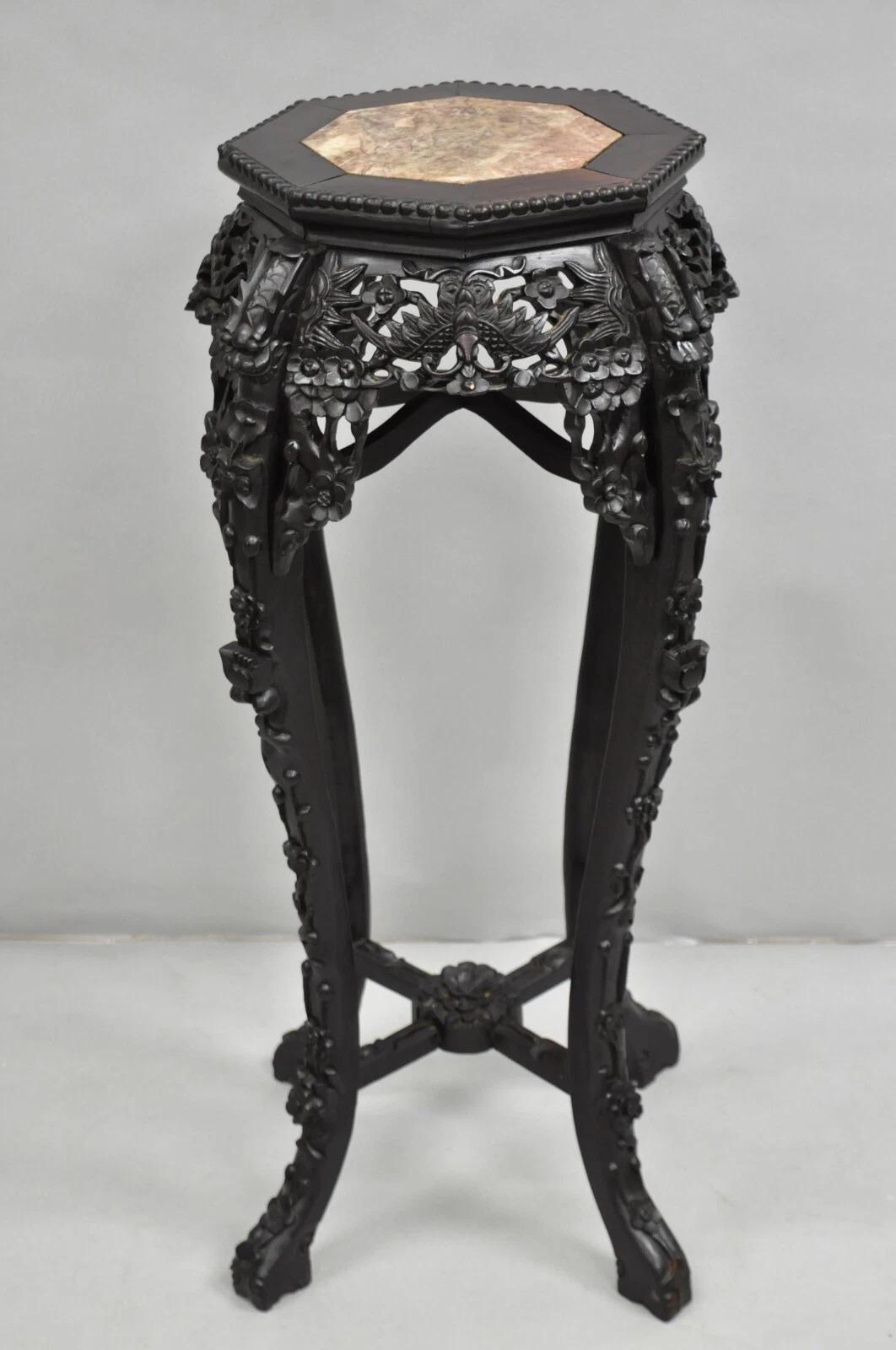 Antique Chinoiserie Chinese Carved Hardwood Marble Top Pedestal Plant Stand. Item features butterfly and foo dog carving, very nice antique table. Circa Early 20th Century. Measurements: 36.5
