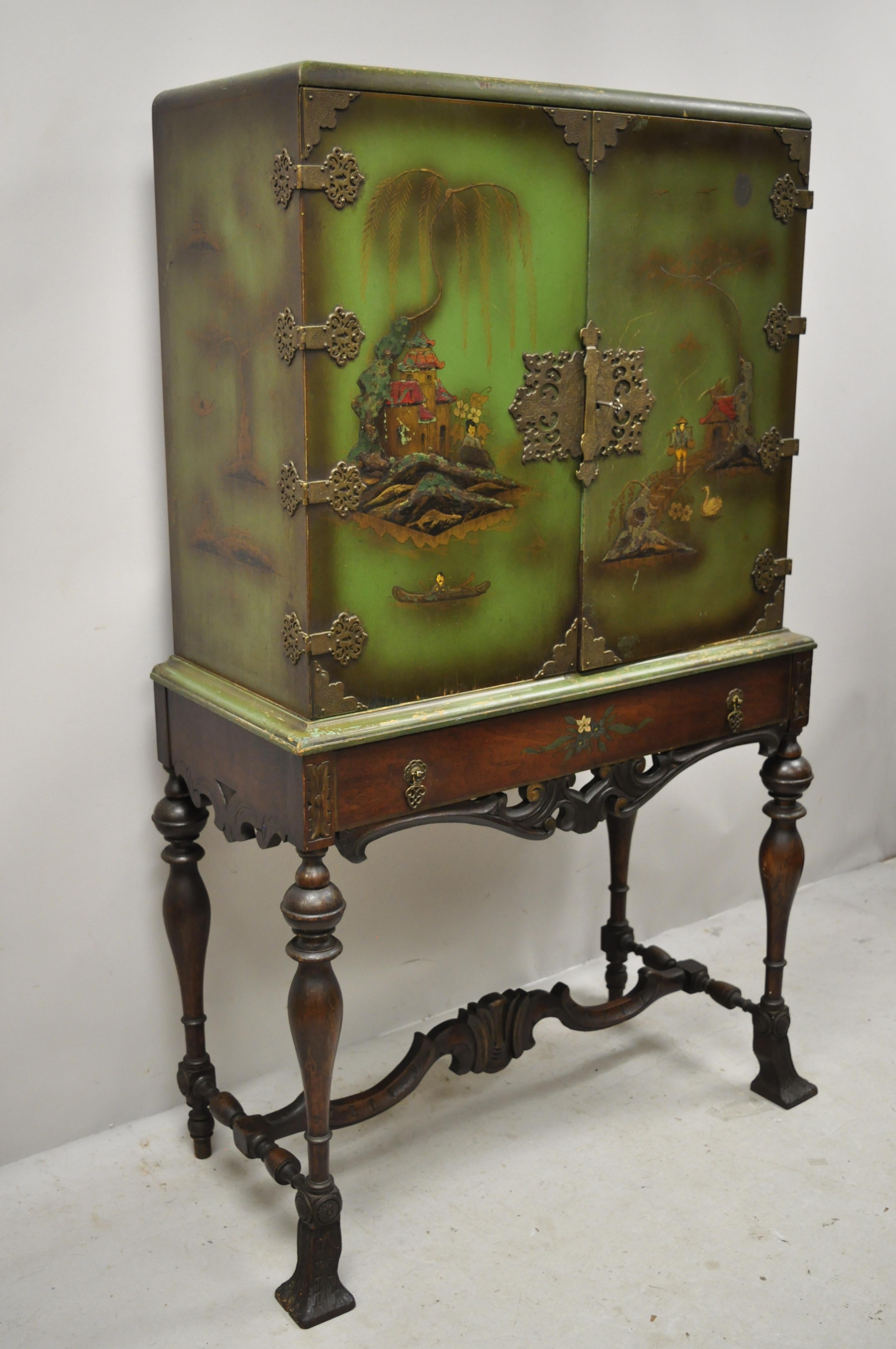 Antique chinoiserie English Georgian green figural oriental painted China cabinet. Item features hand painted oriental scenes, distressed finish, nicely carved details, 2 swing doors, 1-drawer, 2 wooden shelves, solid brass hardware, circa early