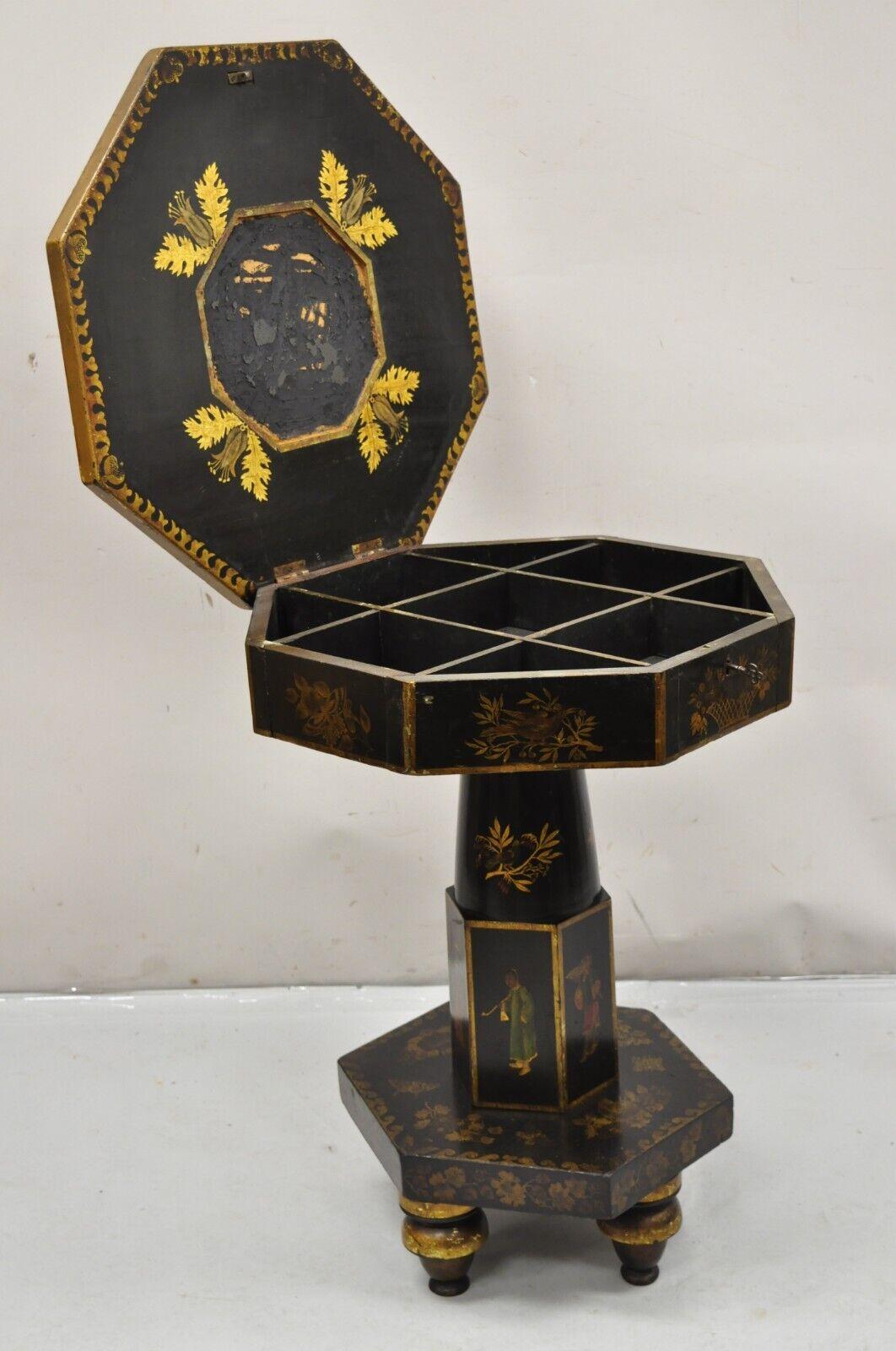 Antique Chinoiserie Gold Gilt Hand Painted Japanned Pedestal Sewing Stand Table. Item features a flip top with fitted interior, gold gilt hand painted details throughout, figural painted top and pedestal base, raised on turn carved feet, original