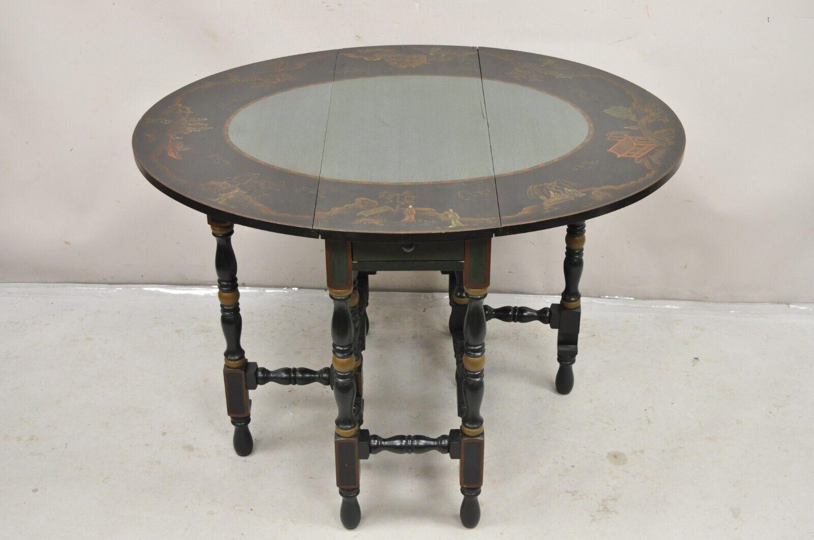 Antique Chinoiserie Lacquered Chinese Gate Leg Drop Leaf Blue and Green Painted Side Table. Item features a single dovetailed drawer, nicely painted details, shapely oval form when open, very nice antique item. Circa Early 20th Century
Measurements: