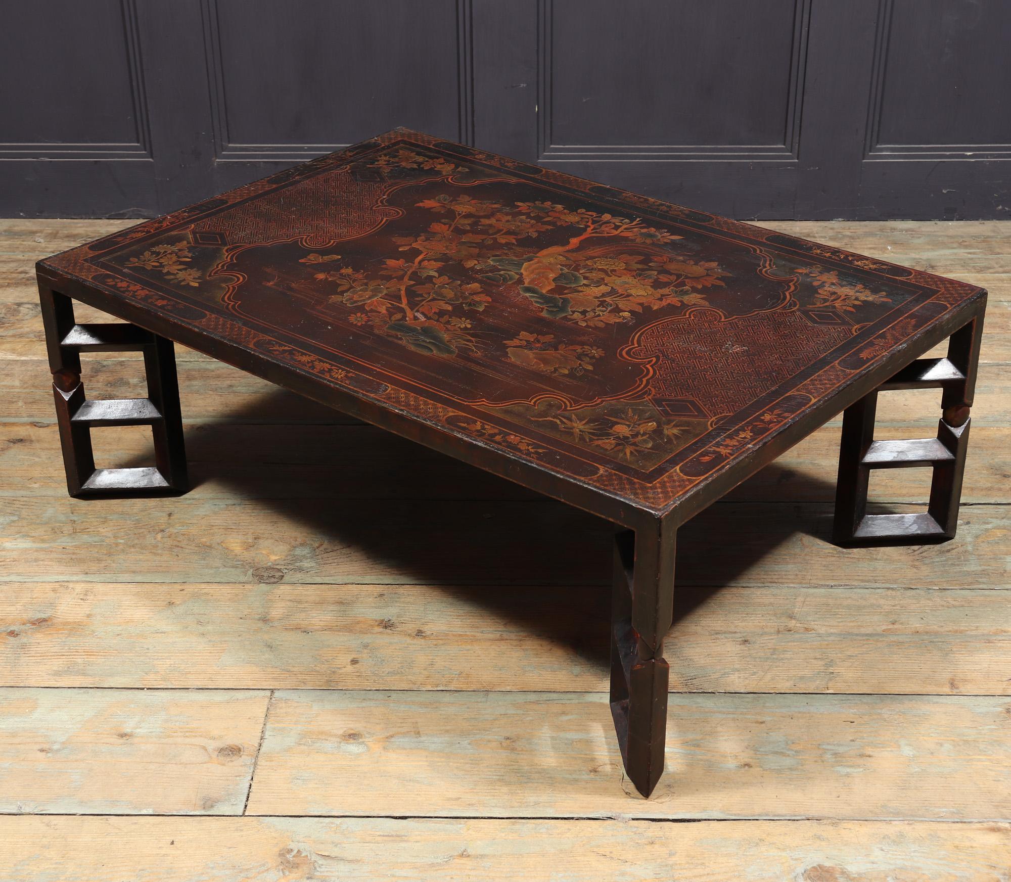 ANTIQUE CHINOISERIE TABLE 
A great example of a chinoiserie table dating back to the early 1900s, adorned with exquisite floral motifs featuring birds and butterflies, all beautifully complemented by intricate geometric patterns. This remarkable