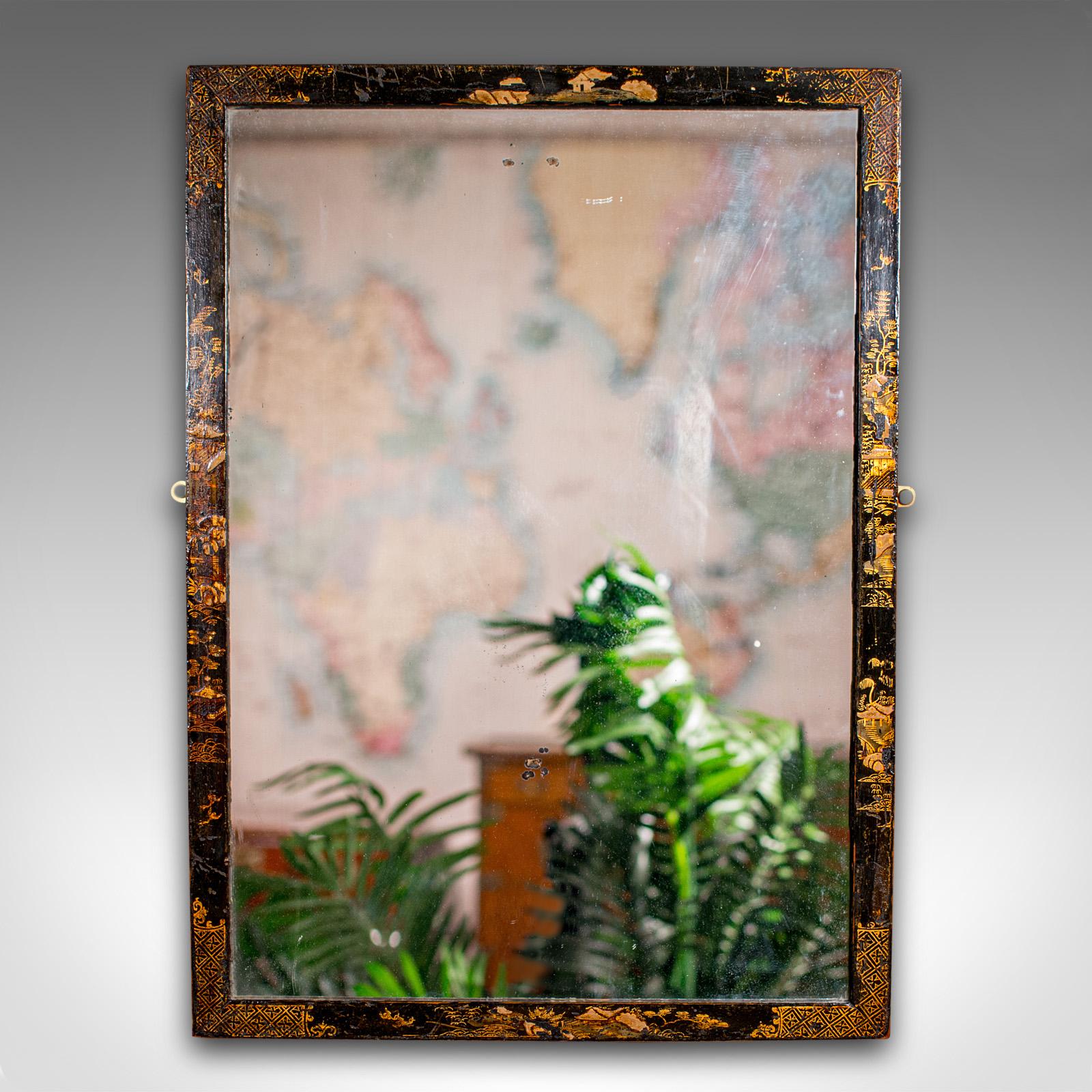 This is an antique Chinoiserie wall mirror. An Oriental, Japanned pine hallway or bedroom mirror, dating to the Victorian period, circa 1880.

Fascinating decorative frame with appealing details
Displaying a desirable aged patina, minor losses under