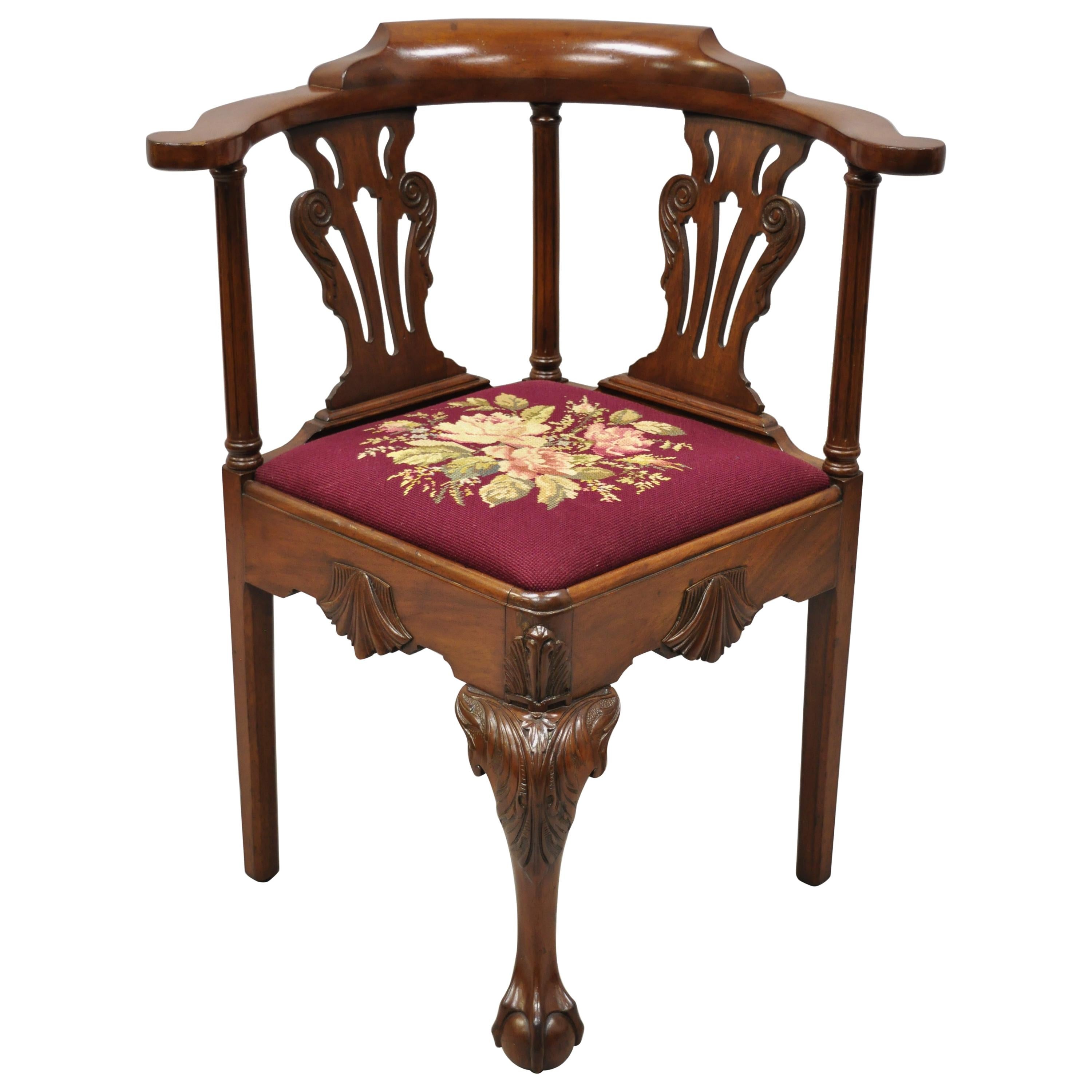 Antique Chippendale Georgian carved ball and claw mahogany corner chair needlepoint seat. Item features a floral needlepoint seat, solid mahogany wood frame, carved ball and claw feet, very nice antique item, quality craftsmanship, circa 1900s.