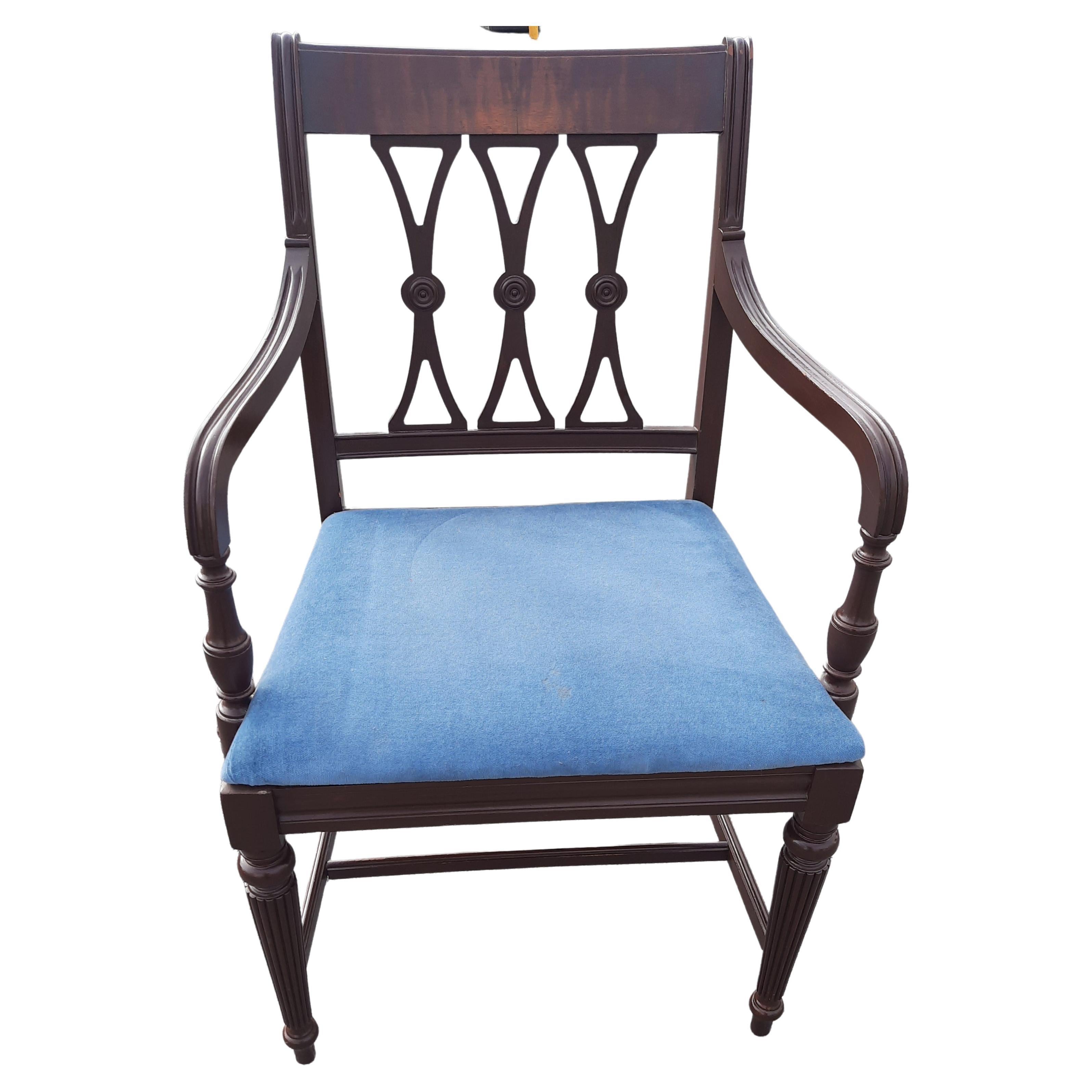 Beautiful Chippendale arm chair with fancy back. Very steady and stable. Measures 24