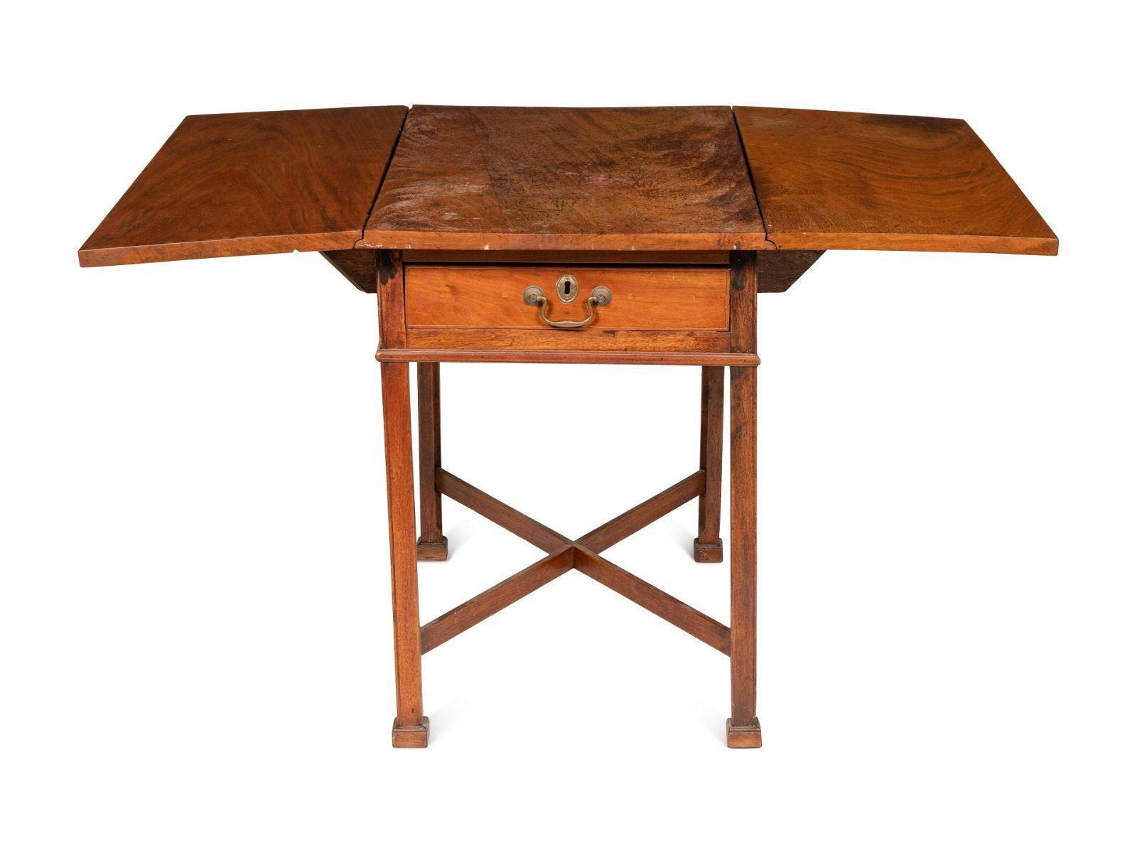 Antique Chippendale Mahogany Stretcher Base Pembroke Table, Late 18th/early 19th Century. Table features a single drawer retaining original fire gilt pull, and cross stretcher characteristic on Pembroke tables.

Dimensions
28 1/2