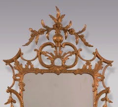 Antique Chippendale period carved wood and gilt rococo mirror