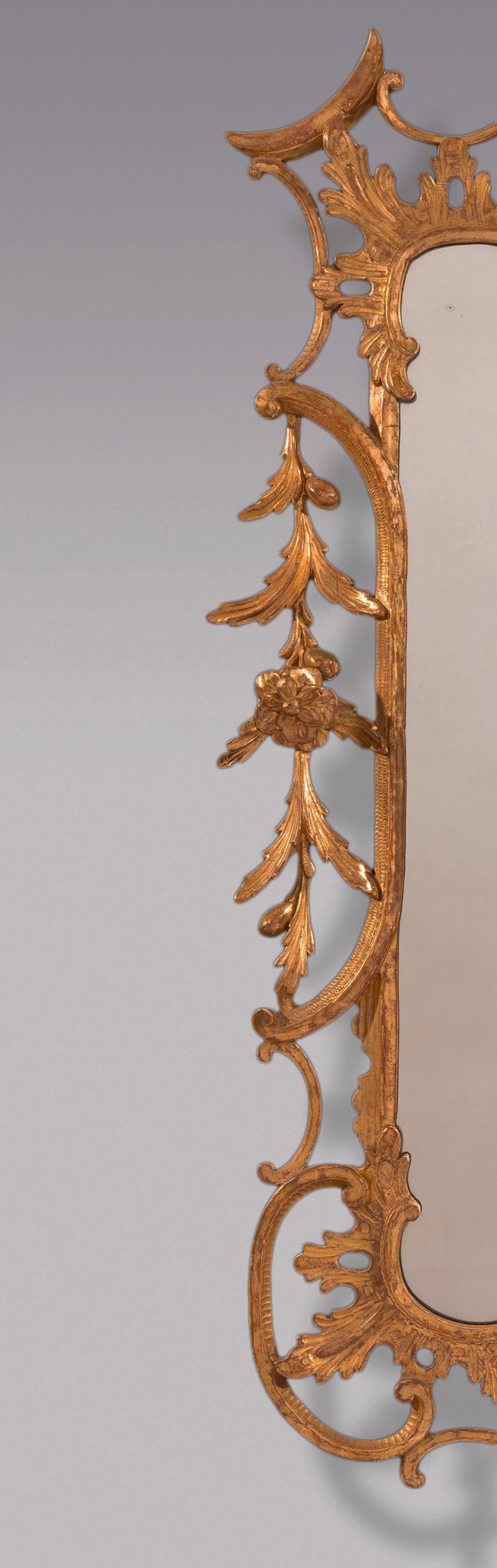 English Antique Chippendale period carved wood and gilt rococo mirror For Sale