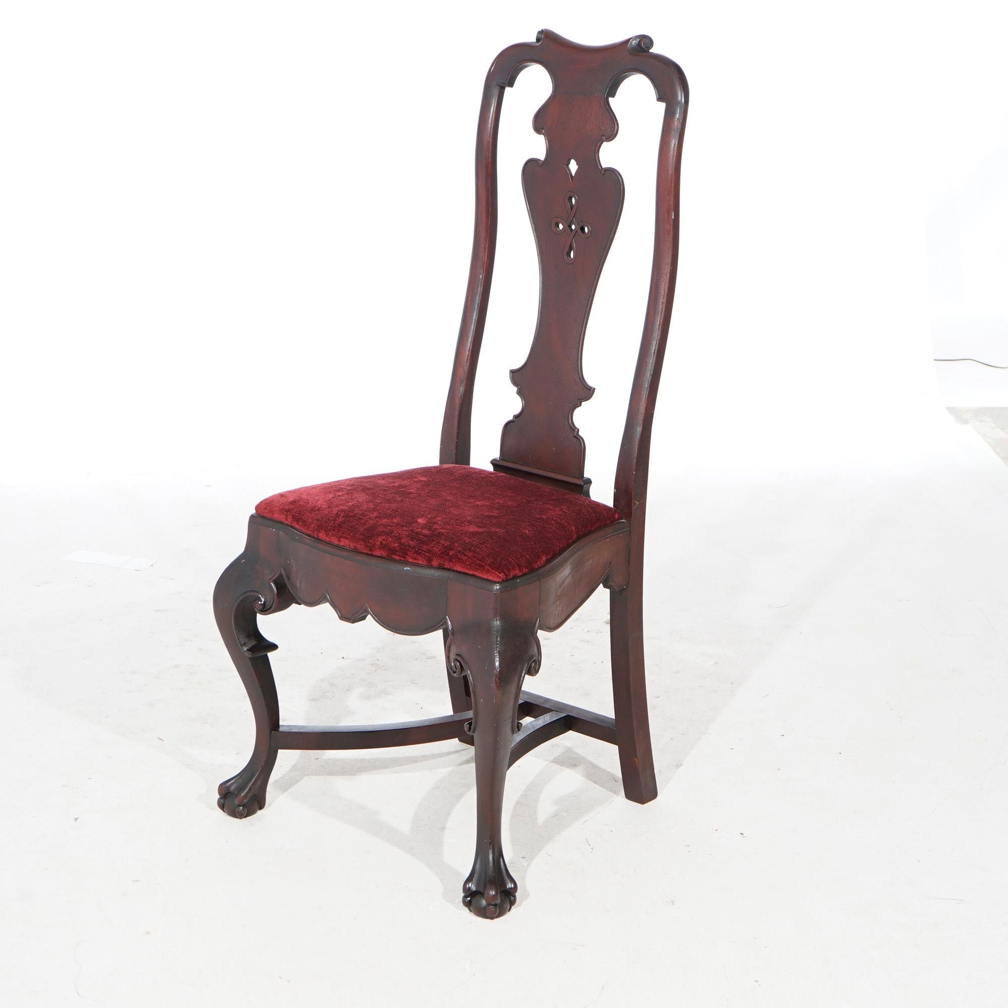 An antique Chippendale style desk chair offers mahogany construction with tall back having urn form slat over upholstered seat, raised on cabriole legs terminating in claw and ball feet, c1890

Measures- 43.25''H x 21''W x 20''D; 19'' seat