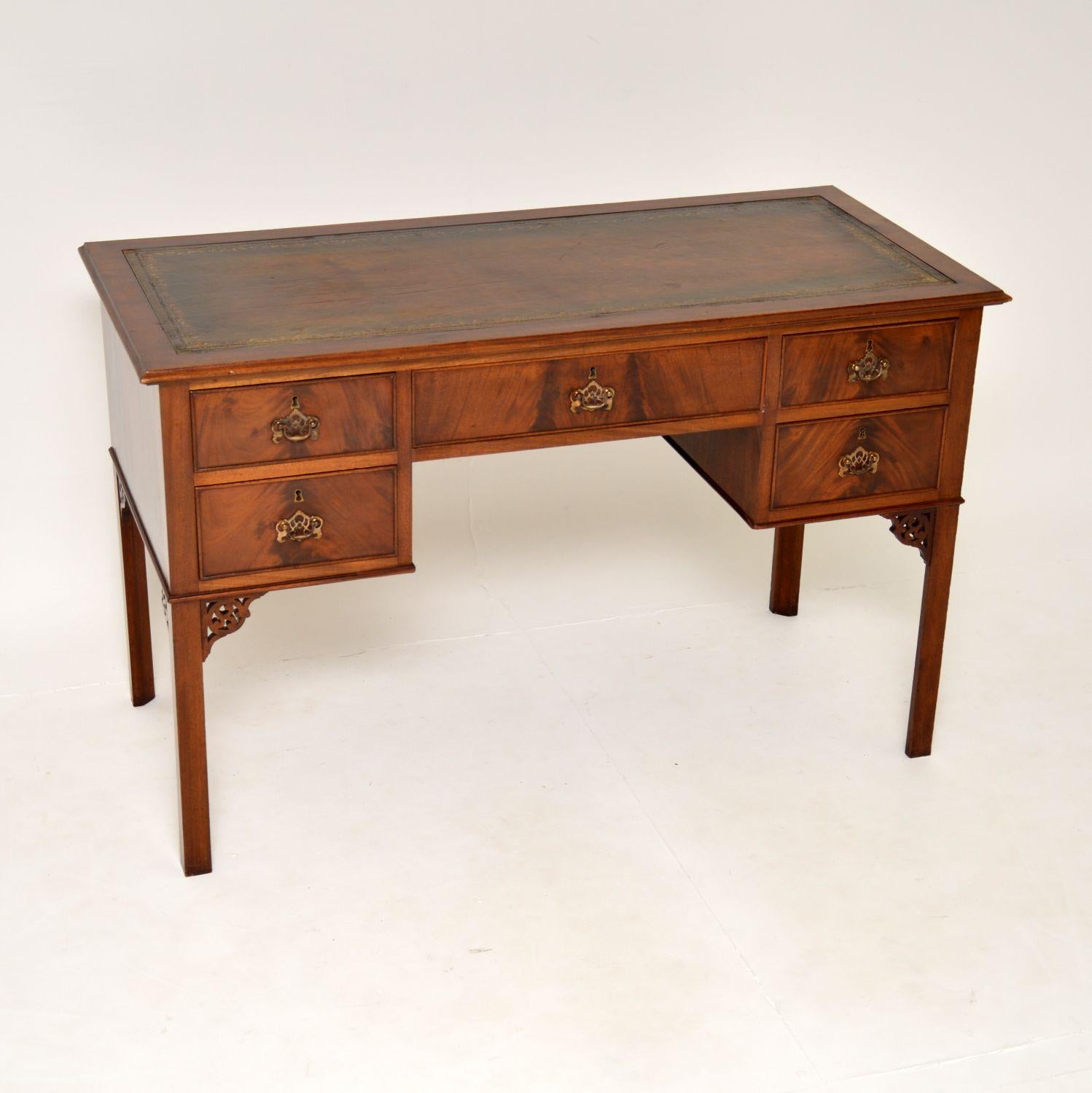A very smart and practical antique Chippendale style desk, made in England & dating from around the 1900-1920 period.

The quality is excellent and this is a very useful size. The wood has beautiful grain patterns, a lovely colour and gorgeous