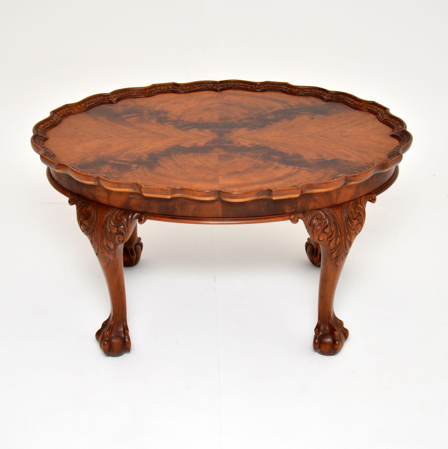 A stunning antique pie crust coffee table in wood. This is in the Chippendale style, it dates from around the 1900-1910 period.

The quality is amazing, it is a very useful size and is very sturdily built. There is crisp and intricate carving all