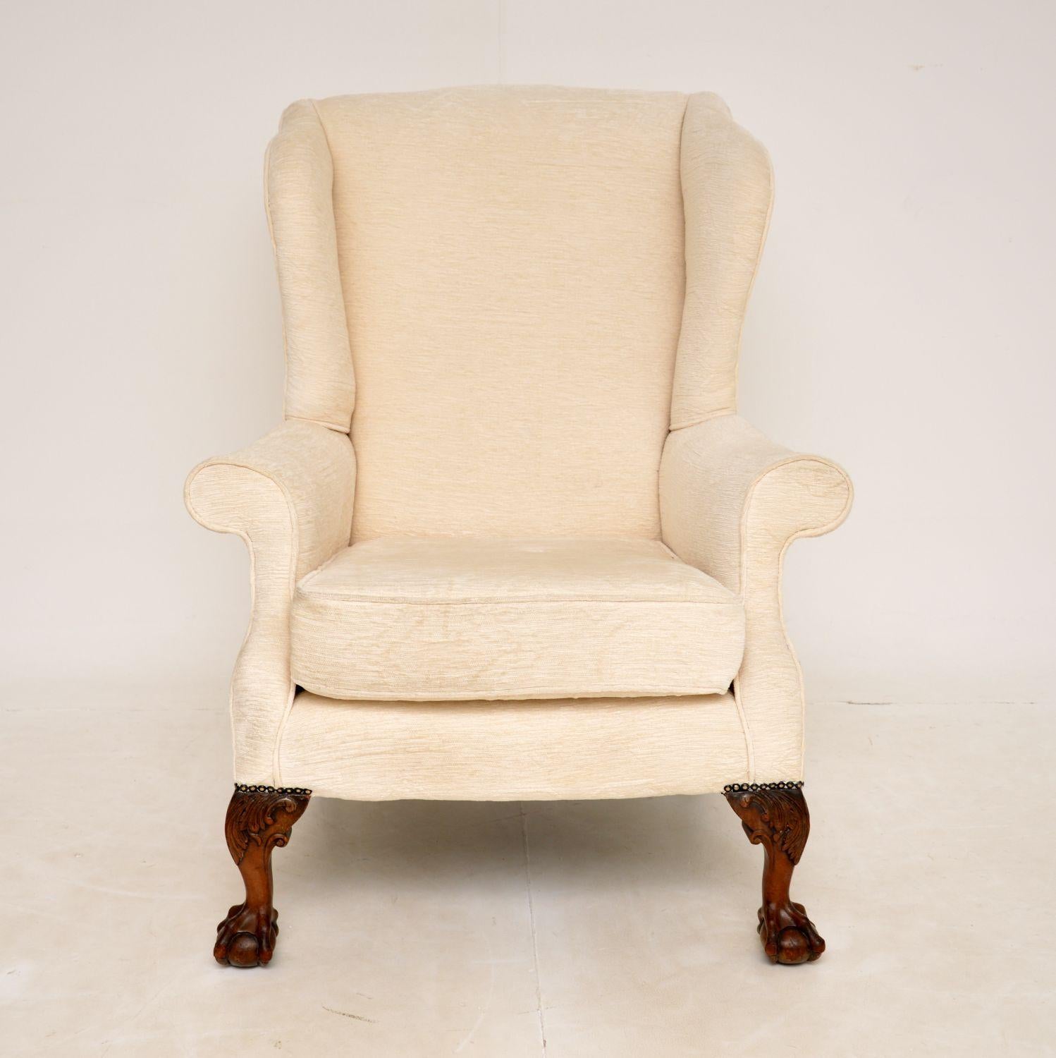 A smart and extremely comfortable antique wing back armchair in the classic Chippendale style. This was made in England, it dates from around the 1910-1920’s period.

It is of super quality, the previous owner had it re-upholstered in this lovely
