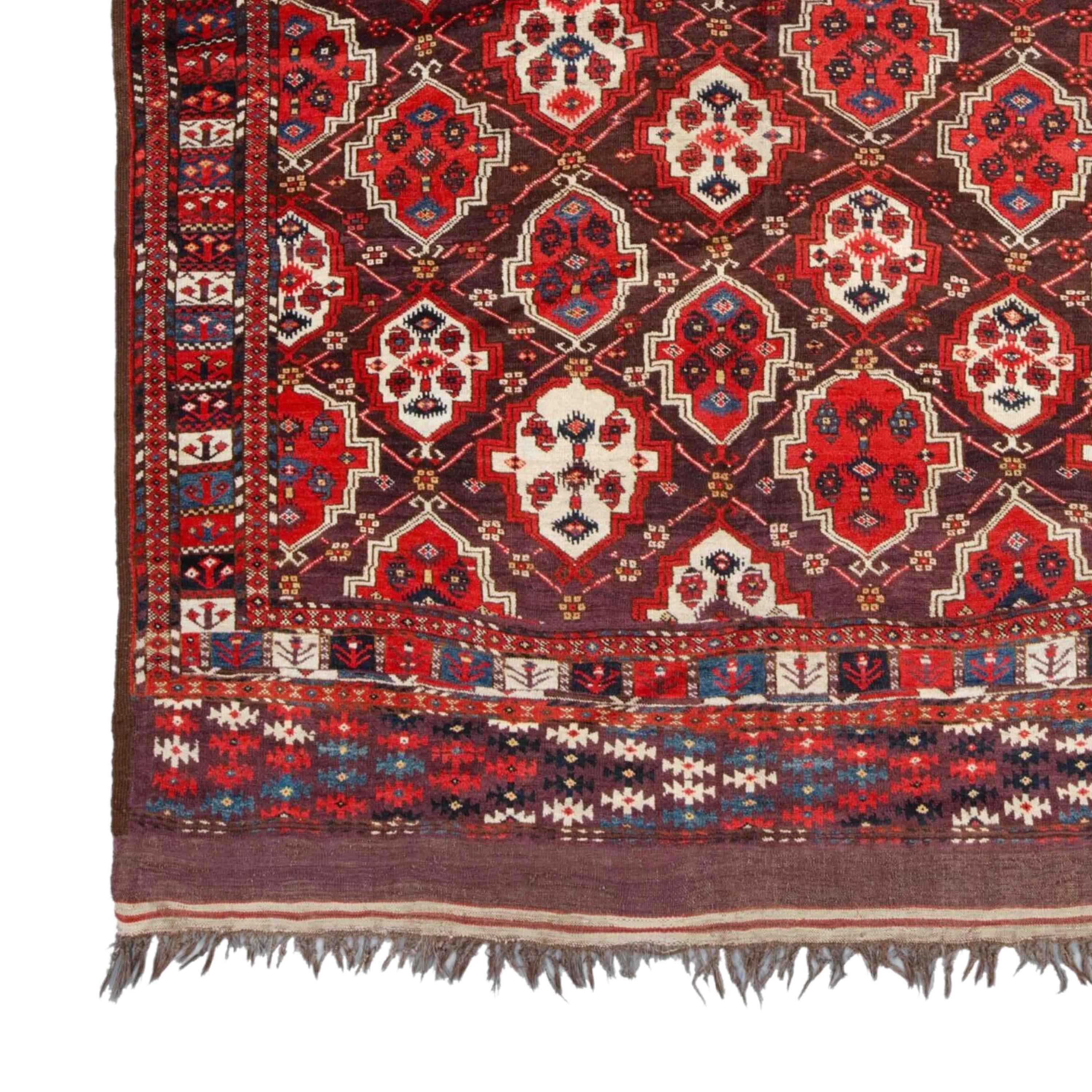 Middle of 19th Century Central Asia Turkmen Chodor Main Rug
Size 190 x 310 cm (74,8 x 122 In)

This elegant Turkmen Chodur Main carpet is a work of art from the mid-19th century. This rug in rich shades of red and burgundy is known for its carefully