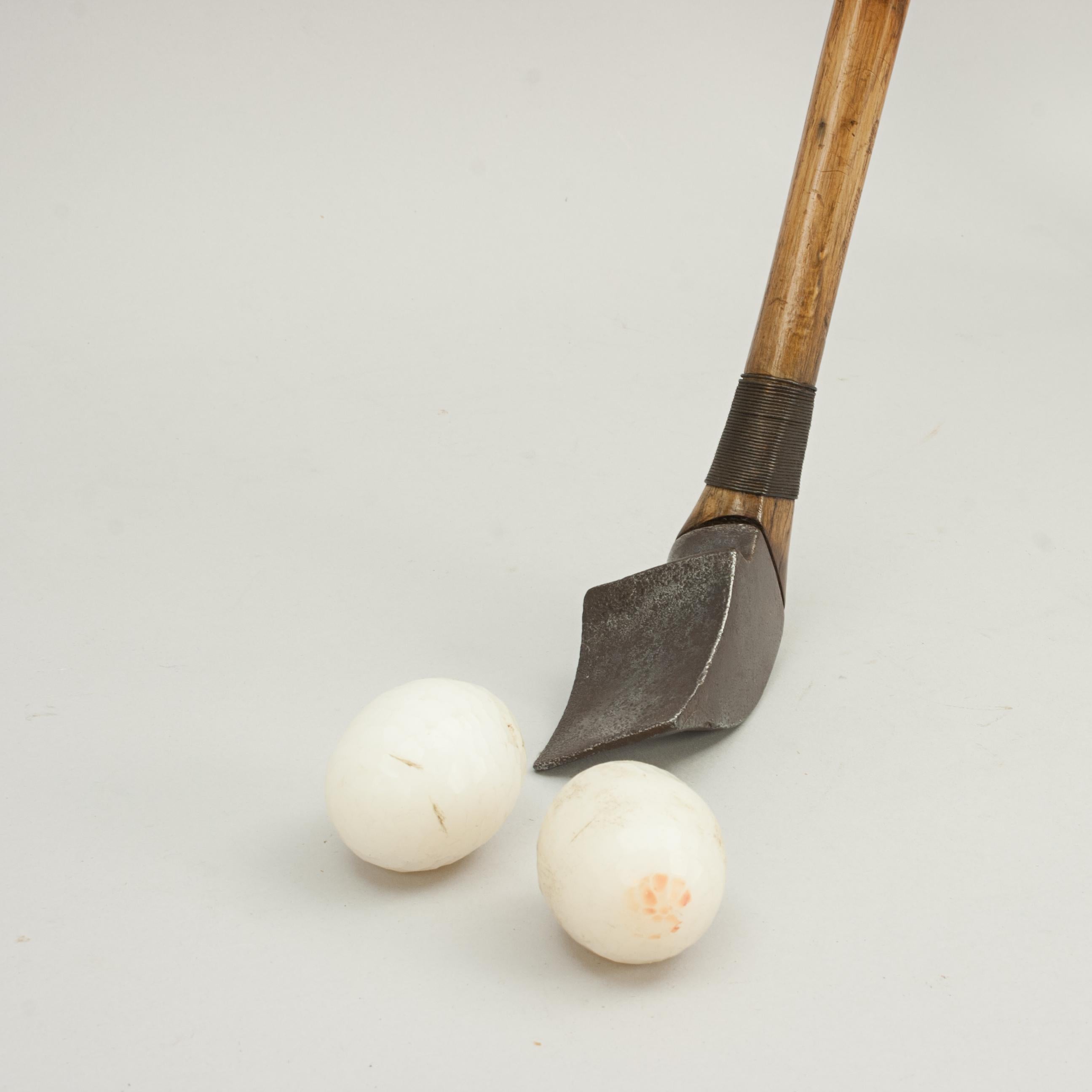 Vintage Crosse, Chole, Choule, Crossage, Jeu De Crosse Club.
The crosse club consists of a cast iron head, the wooden shaft with very unusual octagonal shape, and a unusual grip. The club head has two faces. The 'plat' face is straight and is used