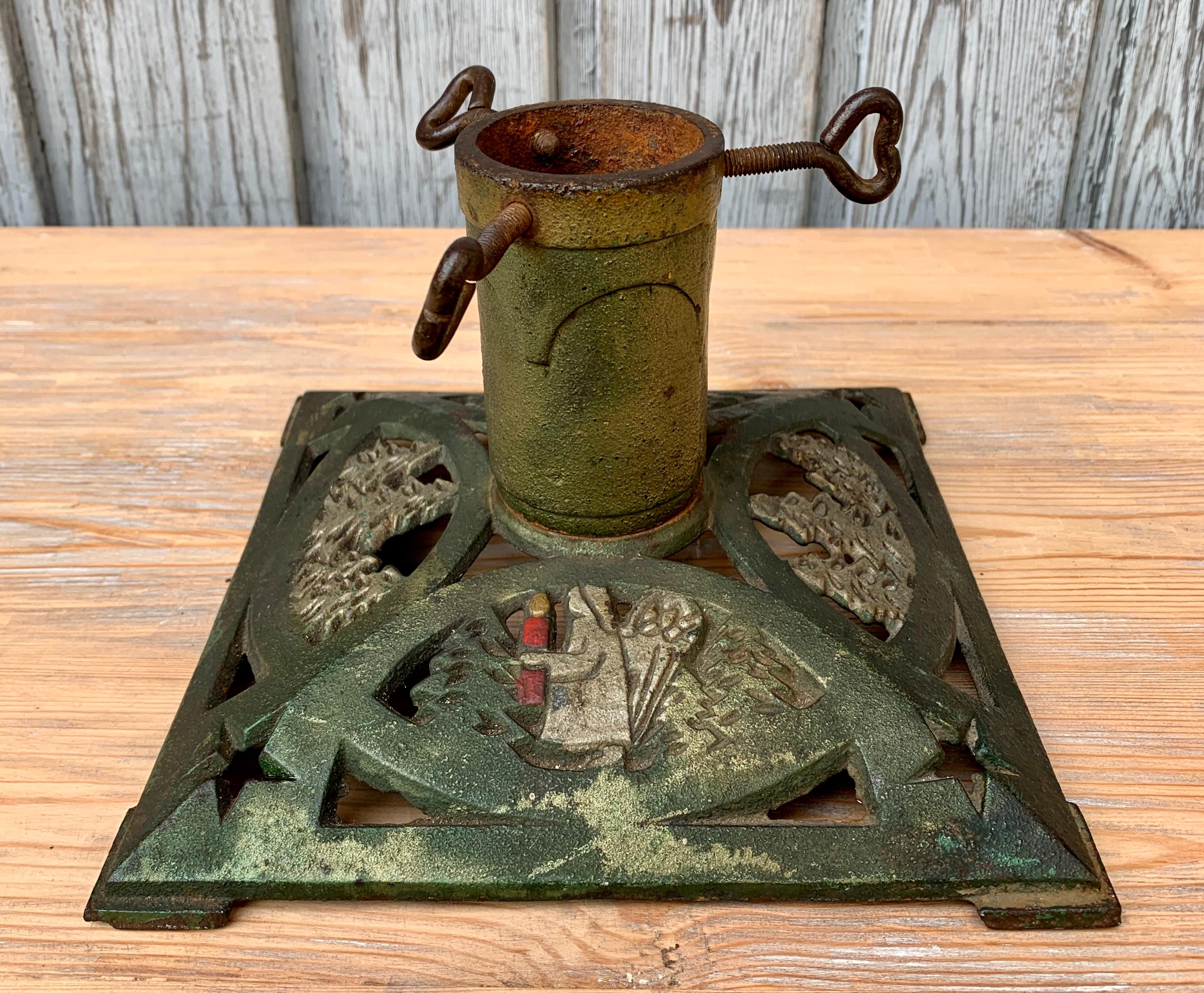 Folk Art Antique Christmas Tree Stand in Original Painted Cast Iron, circa 1900