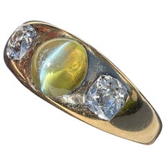 Antique Chrysoberyl and Diamond Three Stone Flush Set Ring