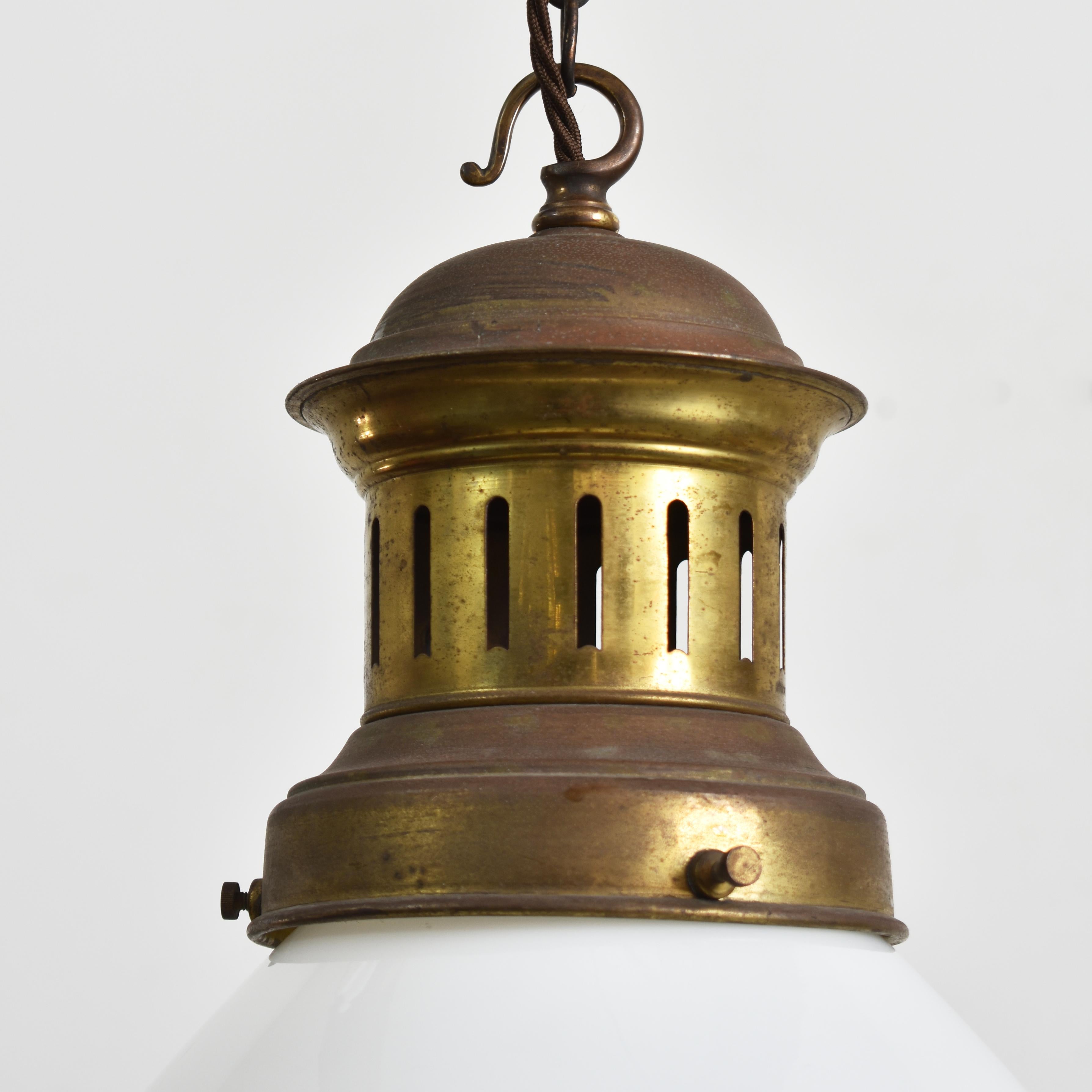Antique Church Opaline Pendant Light – Y

An original opaline glass pendant light manufactured by GEC. The light has a milk glass opaline shade and original aged brass hanging gallery. The gallery finish has been left untouched in it original