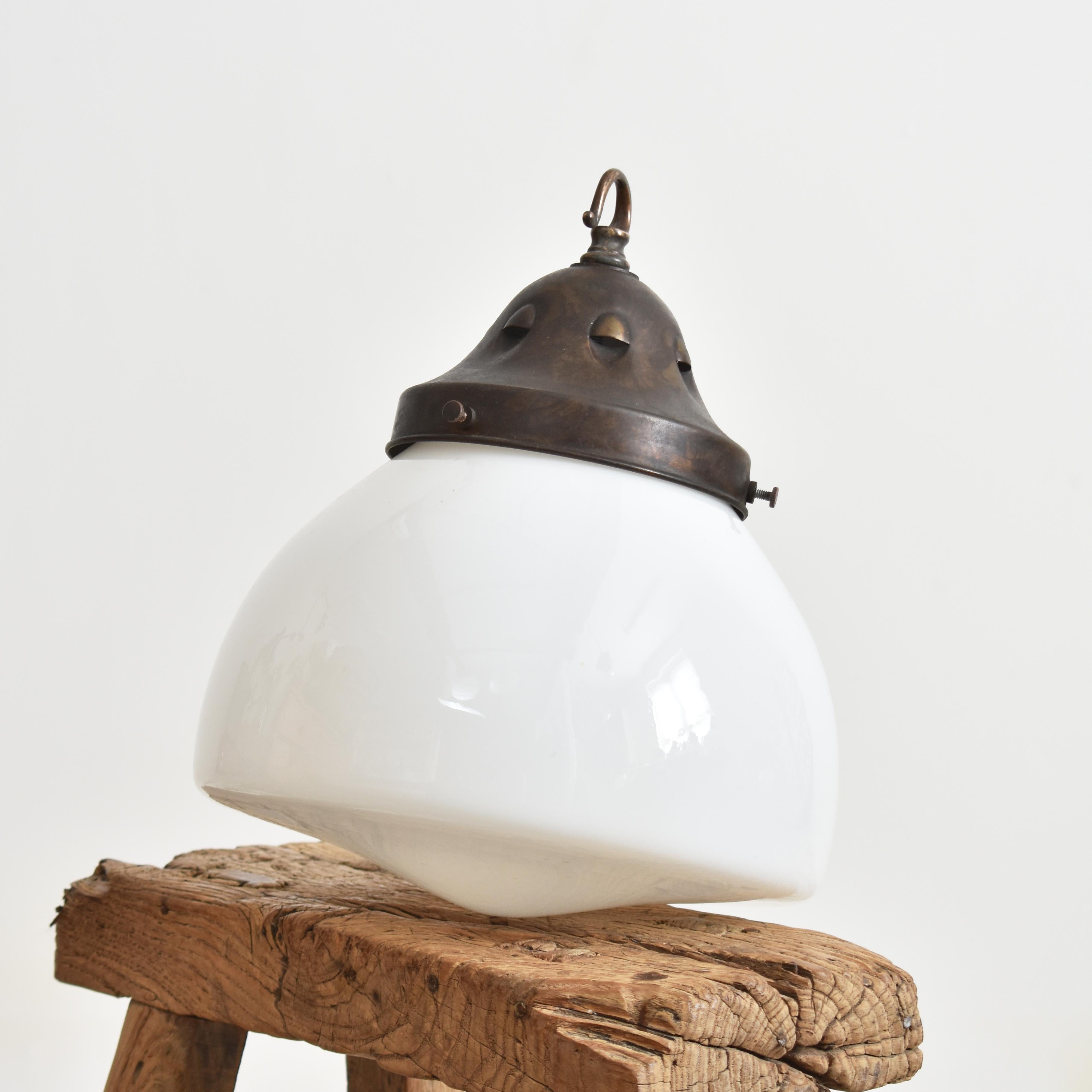 Antique Church Opaline Pendant Light – AB

An original opaline glass pendant light. The light has a milk glass opaline shade and original brass hanging gallery. The gallery finish has been left untouched in it original