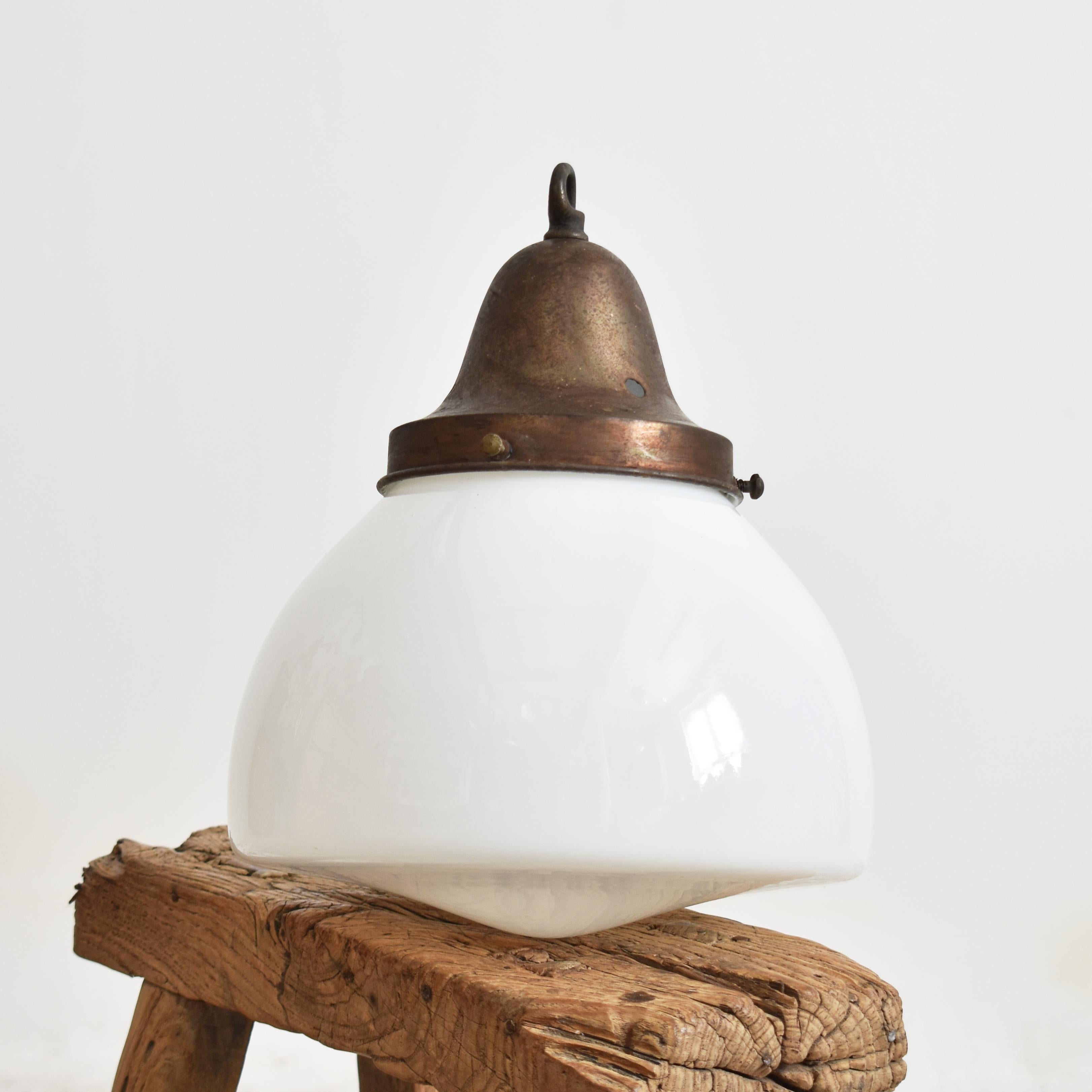 Antique Church Opaline Pendant Light – AA

An original opaline glass pendant light. The light has a milk glass opaline shade and original brass hanging gallery. The gallery finish has been left untouched in it original