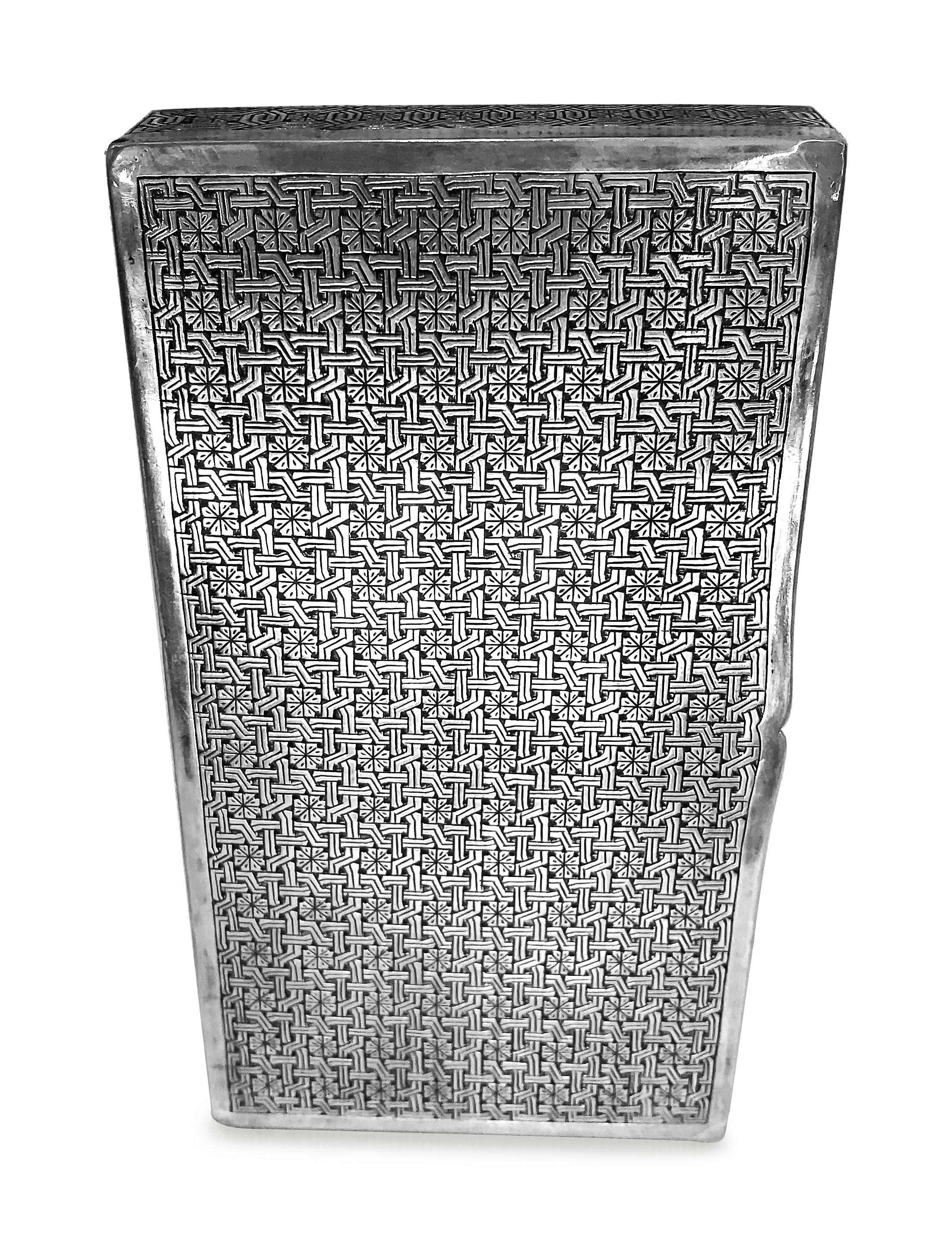 Antique  cigarette box in rectangle shape . This unique box is all hand carved and  the design is absolutely fantastic  . The design is like woven lines .the box is Persian silver 0.84 proof . 
Designer : Aghazadeh .tehran
weight :285 grams
W : 3'
L