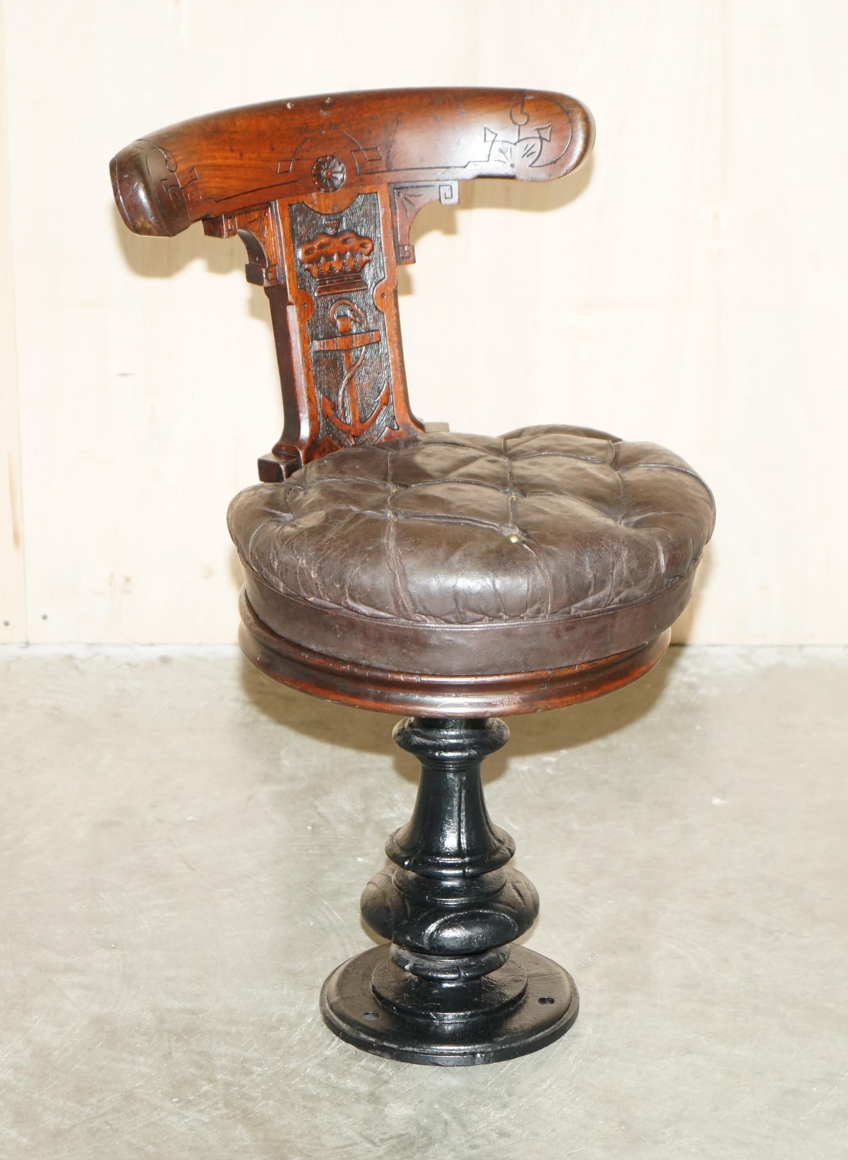 Royal House Antiques

Royal House Antiques is delighted to offer for sale this stunning original, circa 1800 hand carved Mahogany ships captains chair depicting a Royal Crown and Anchor to the backrest and with the original leather Chesterfield