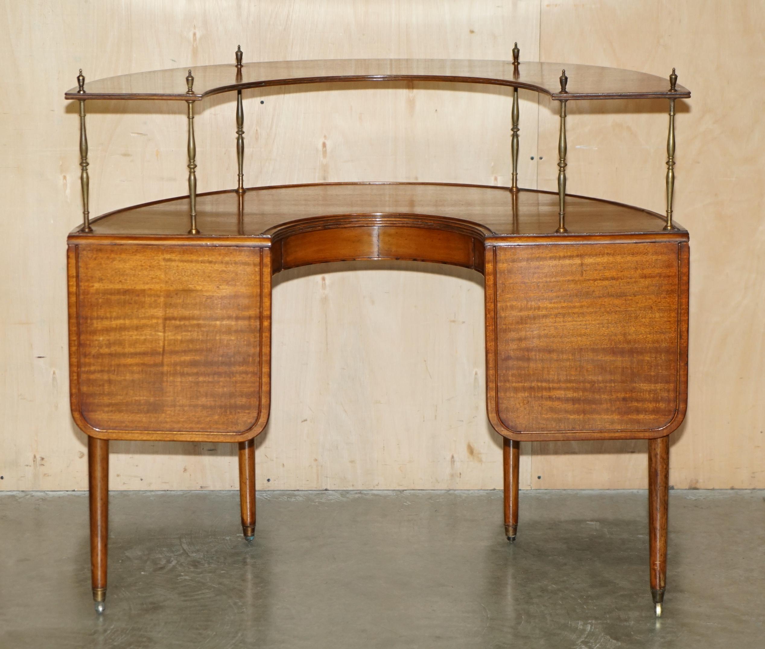 Royal House Antiques

Royal House Antiques is delighted to offer for sale this absolutely stunning and very rare original Circa 1840 English Mahogany Hunt Table with second tiered shelf, hidden drawer and twin extensions 

Please note the delivery