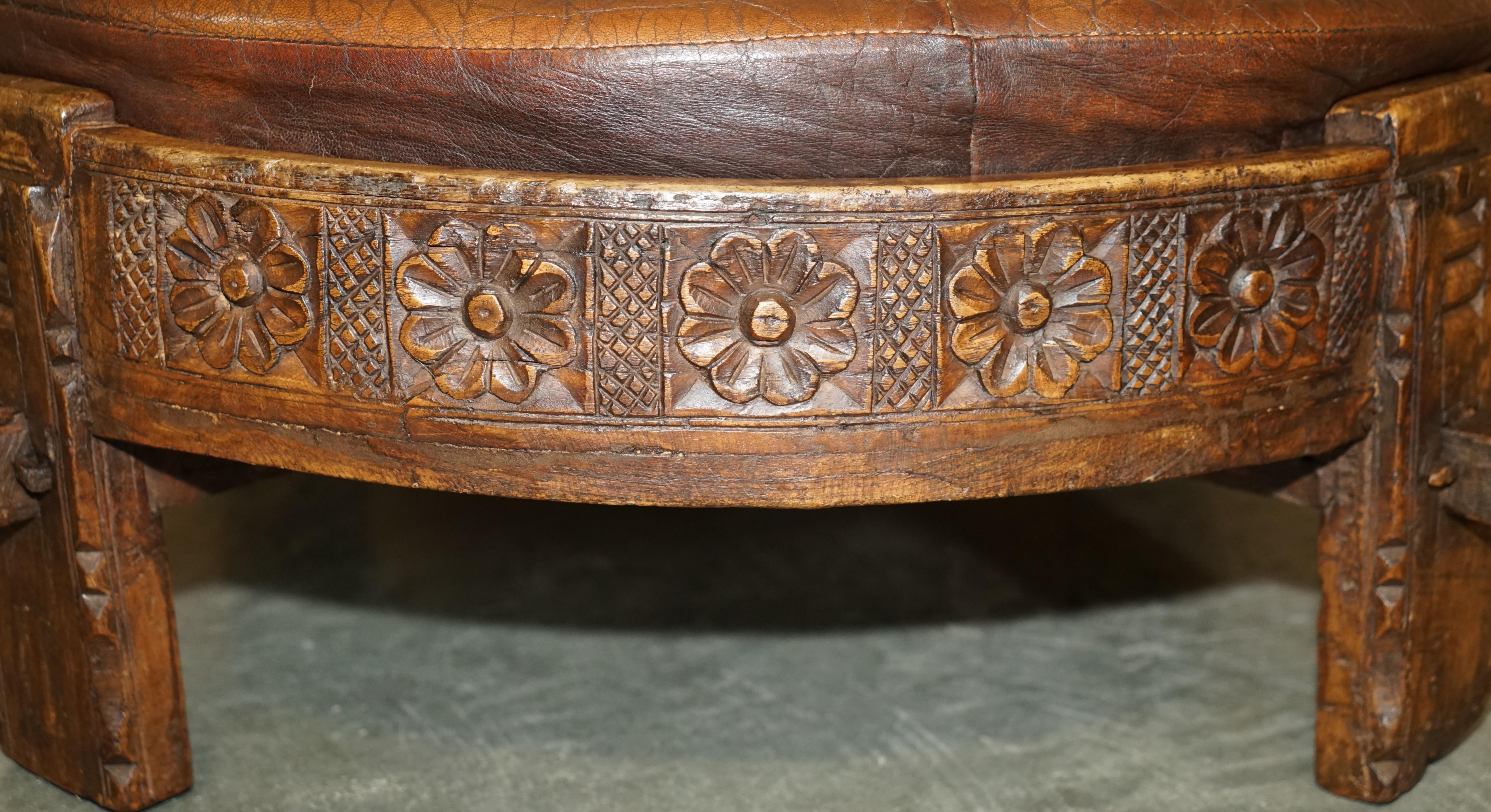 Hand-Carved Antique circa 1850 Hand Carved Brown Leather Olive Press Coverted to Footstool For Sale