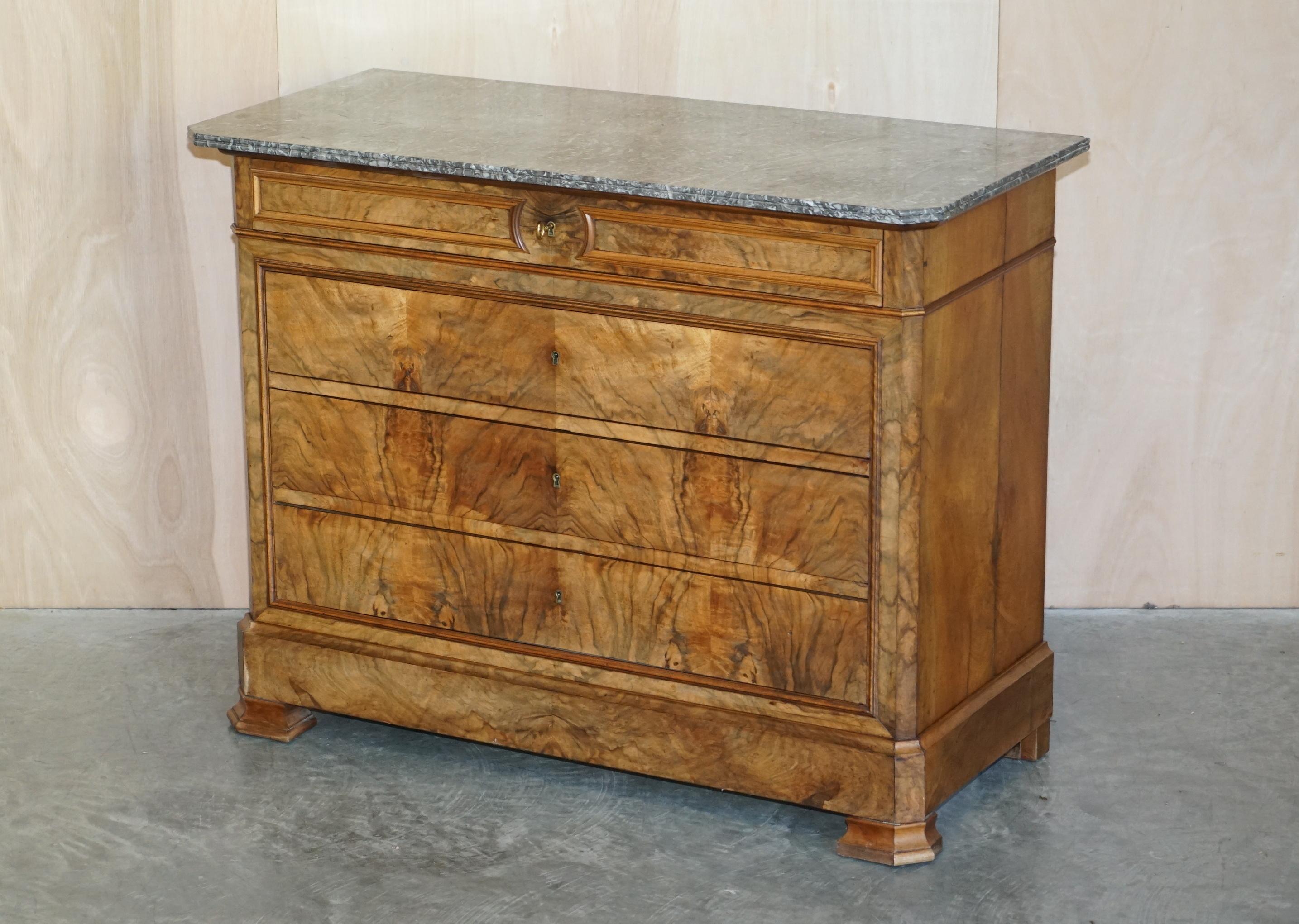 We are delighted to offer for sale this exquisite circa 1860 Continental Walnut & Marble chest of drawers with the original key

A very good looking and well made piece, this is Biedermeier furniture at its best, the colour and grain of the timber