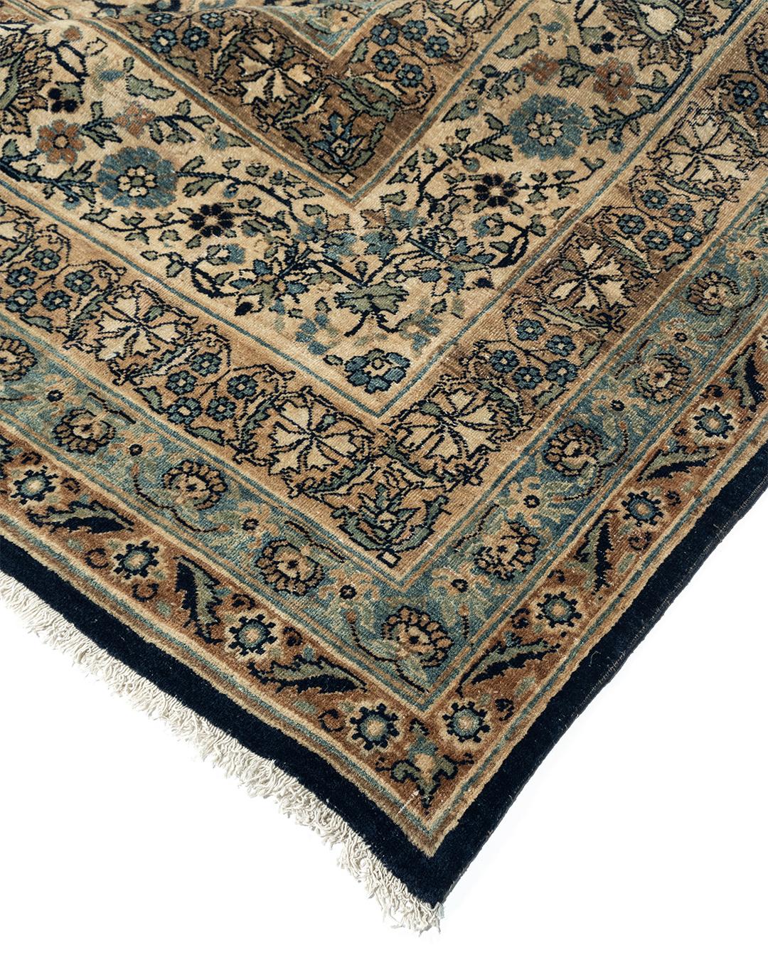 13' x 20'. Kirmans of the late 19th century are thin fine rugs with most often overall repeat pattern. Here a subtly colored diagonal lozenge lattice encloses floral medallions. There is no distinct field color but rather a harmony of rust honey