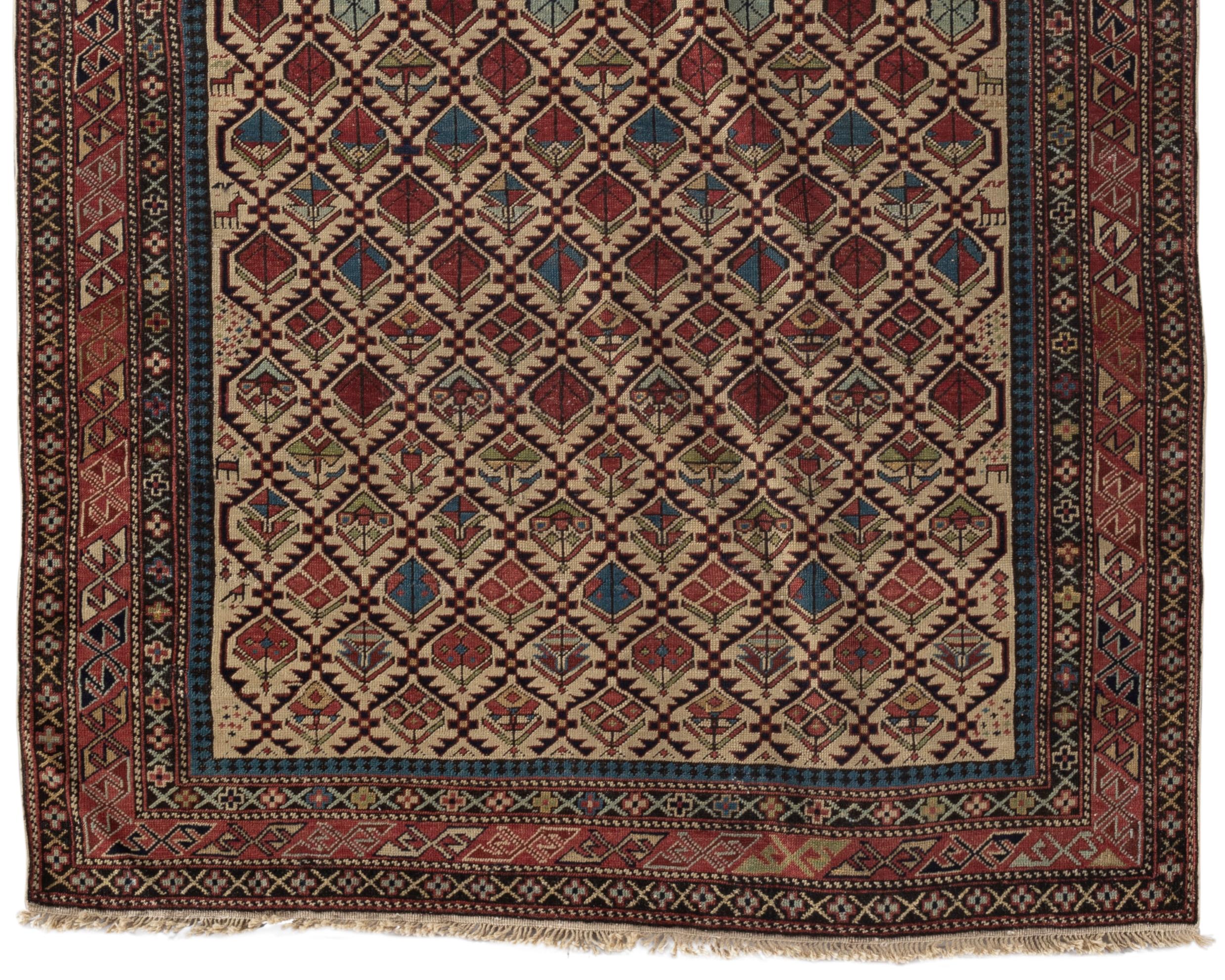 Antique circa 1880 Caucasian Dagestan Prayer rug. The delightful floral elements on the ivory ground together with the multiple borders in a variety of designs styles and colors create a rug which will bring brightness to any room. Dagestan is