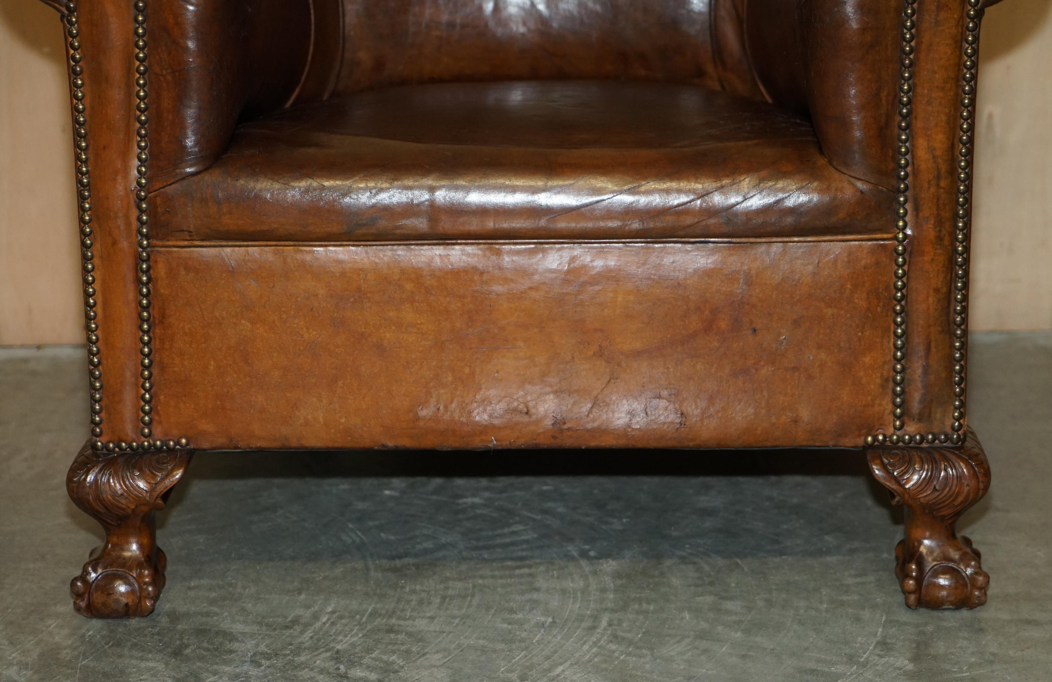 Hand-Crafted Antique circa 1880 Hand Carved Claw & Ball Feet Brown Leather Club Tub Armchair For Sale