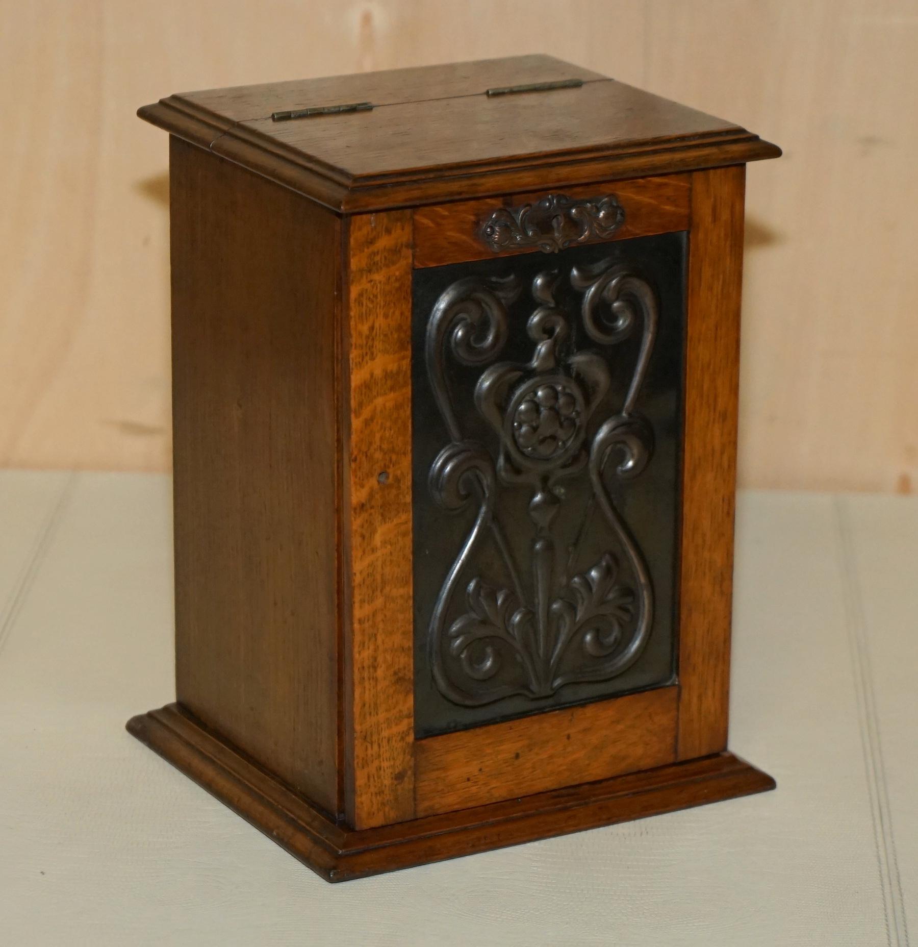 Royal House Antiques

Royal House Antiques is delighted to offer for sale this stunning Libertys of London Art Nouveau Smokers pipe box including two original antique pipes

A very well made good looking and decorative piece, it comes complete with