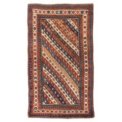 Alfombra antigua anudada a mano kazaka roja circa 1880