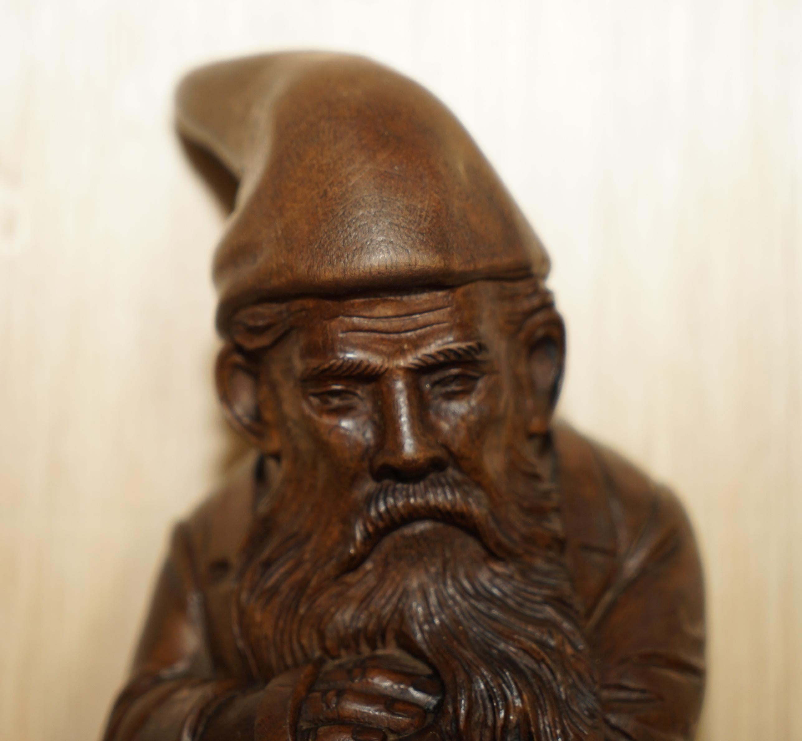 We are delighted to offer for sale this exceptionally rare, stunning, original circa 1880 Swiss made Black Forest wood, Dwarf whip hook 

These are a very very rare piece, the Dwarfs almost never come up for sale and this is the only cross legged