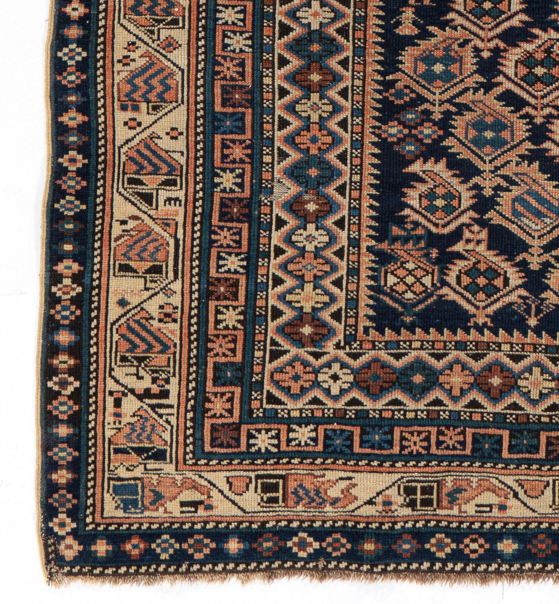 3'5 X 4'4. These types of antique Caucasian rugs were woven in the eastern part of the region, mostly along the west coast of the Caspian Sea. They display intricate designs, often in prayer (niche) formats; shorter, often velvety piles; complex