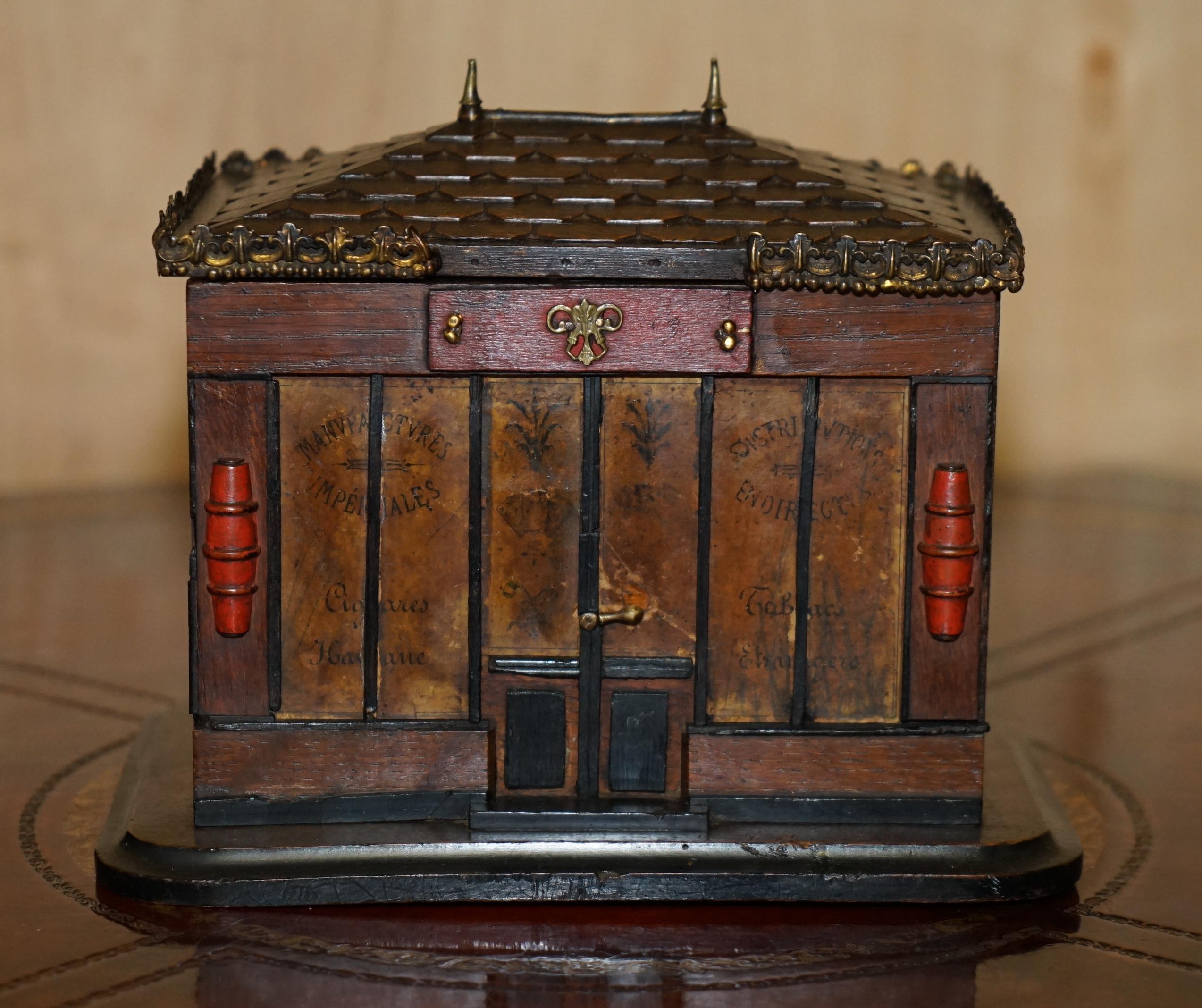 Royal House Antiques

Royal House Antiques is delighted to offer for sale this rather lovely antique original circa 1880-1900 French made Pagoda top Chinese shop cigar box

A very good looking and well made piece, it is hand carved all over